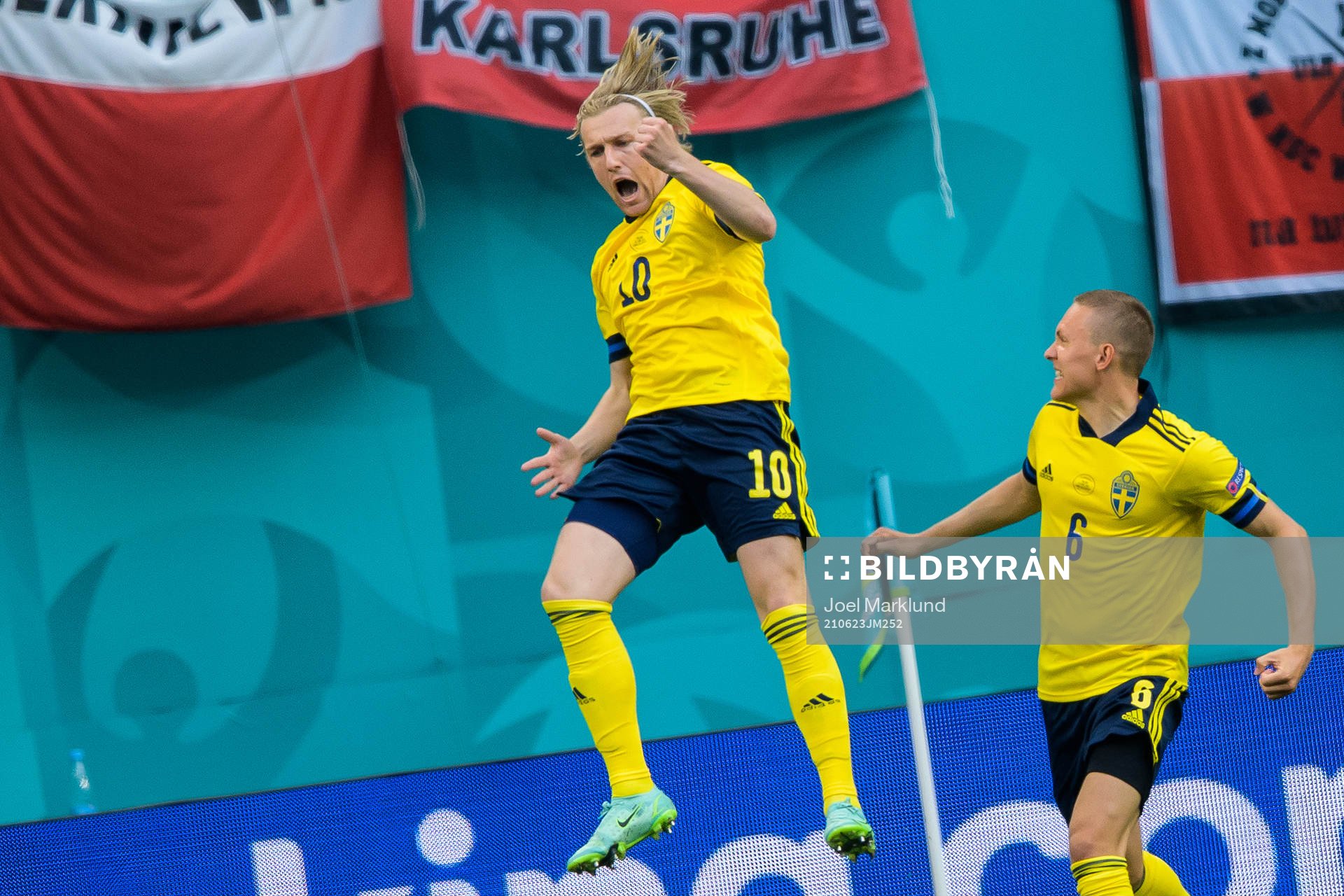 Emil Forsberg and Ludwig Augustinsson of Sweden celebrate