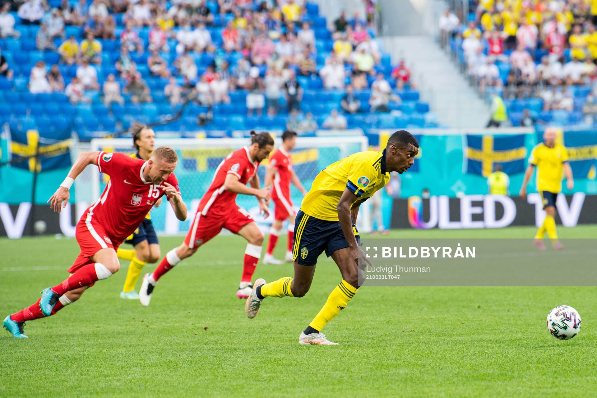 Alexander Isak of Sweden and Kamil Glik of Poland