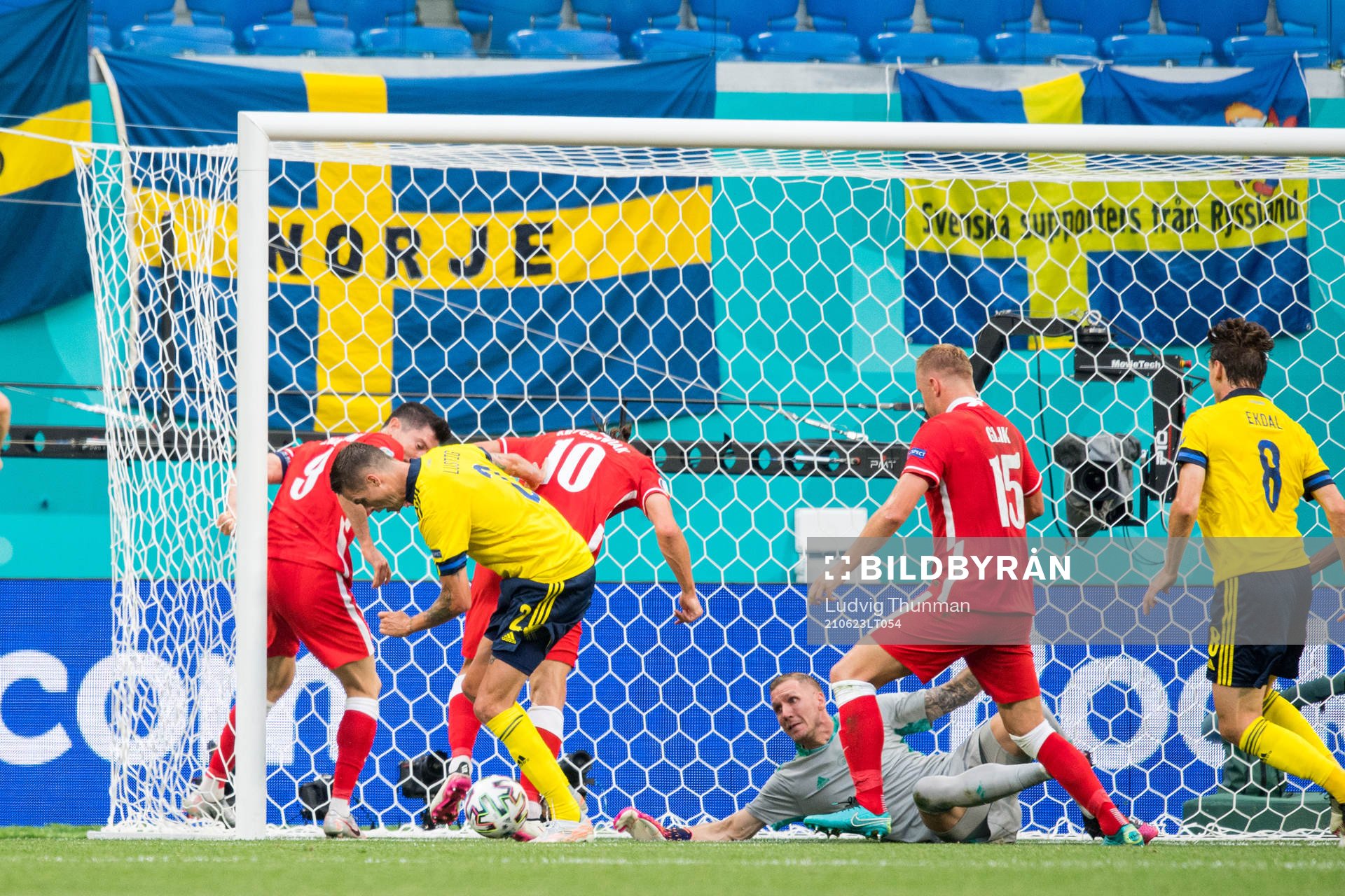 Mikael Lustig and goalkeeper Robin Olsen of Sweden against