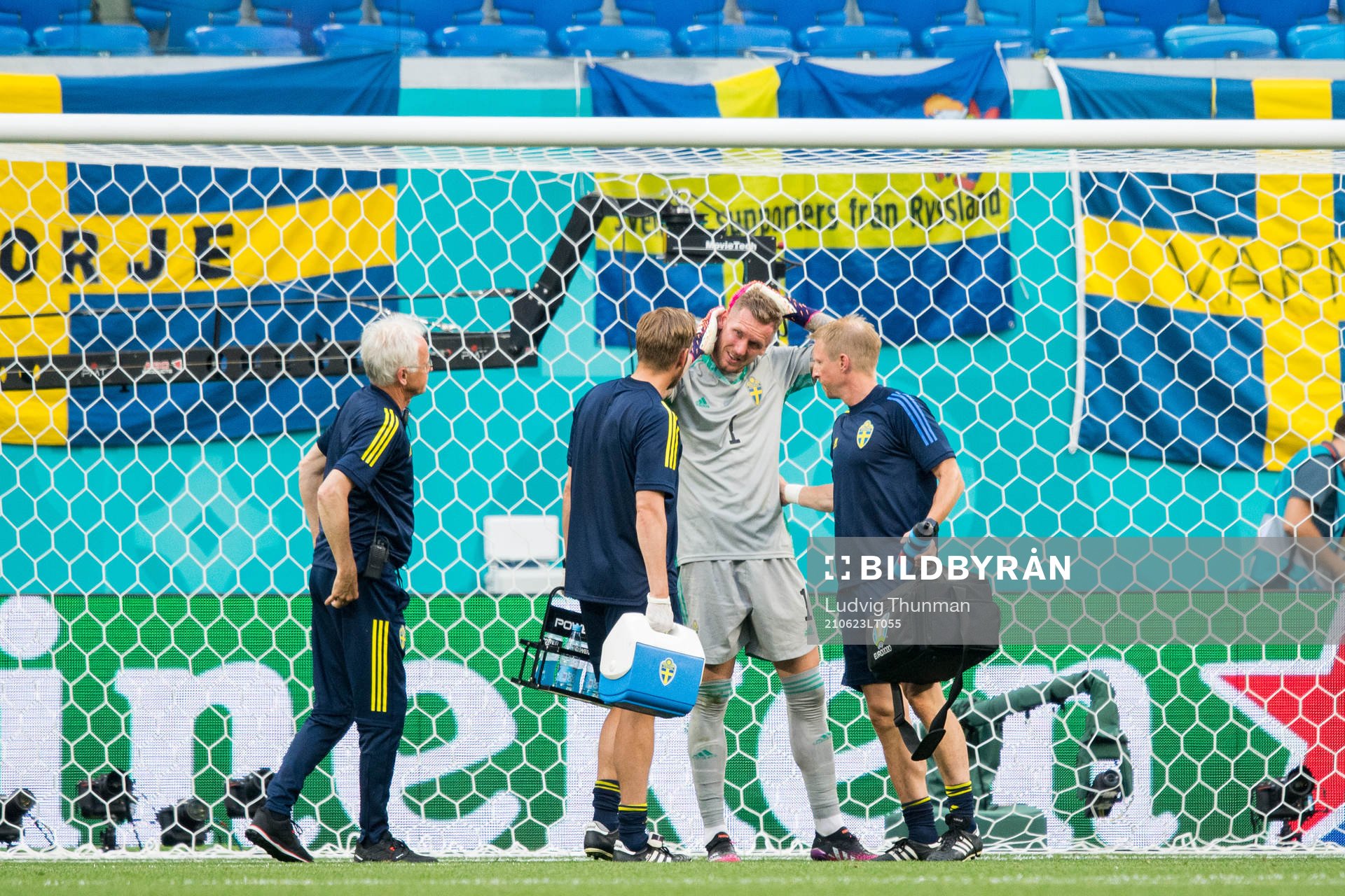 Goalkeeper Robin Olsen of Sweden in pain