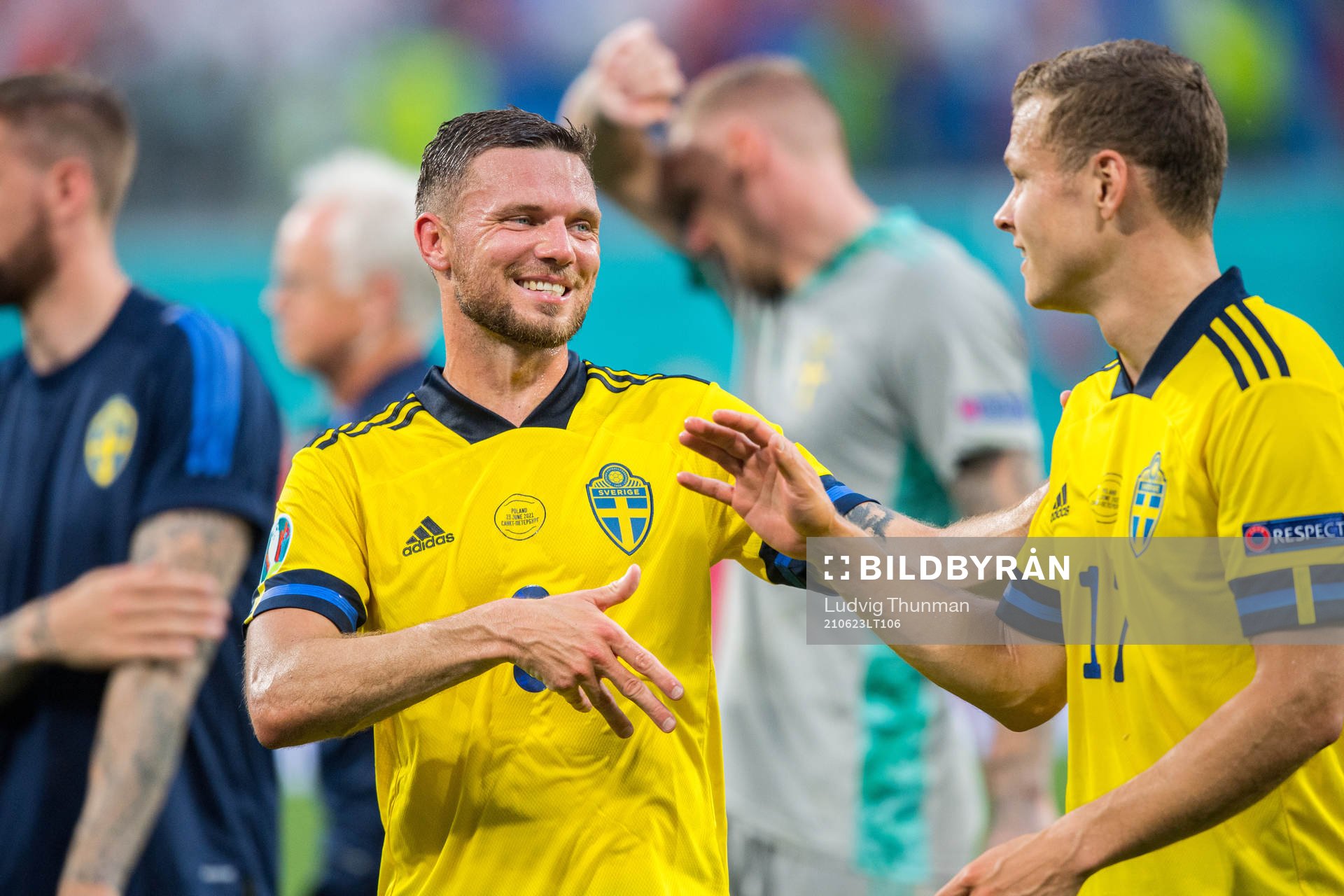 Marcus Berg and Viktor Claesson of Sweden celebrate