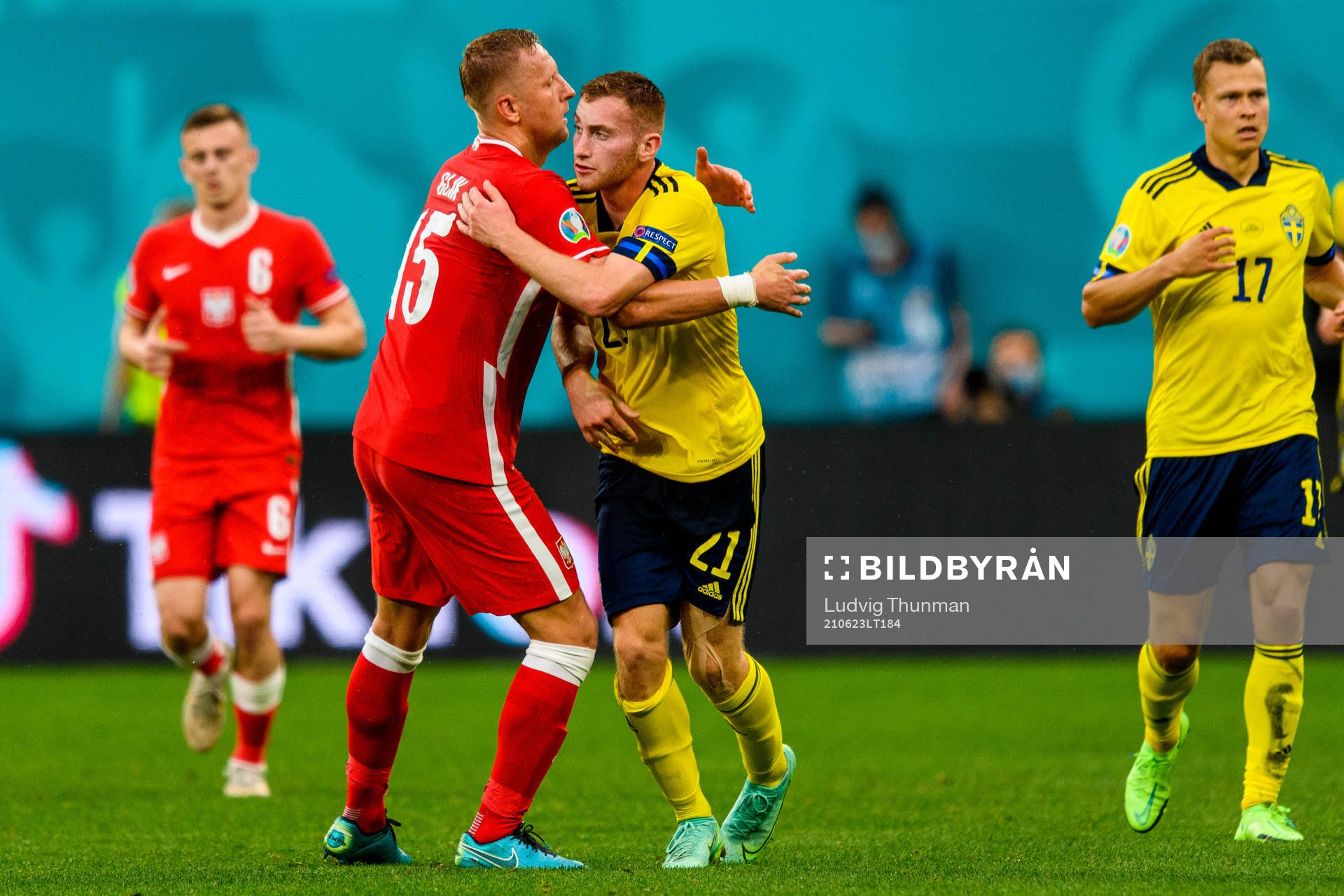 Dejan Kulusevski of Sweden and Kamil Glik of Poland