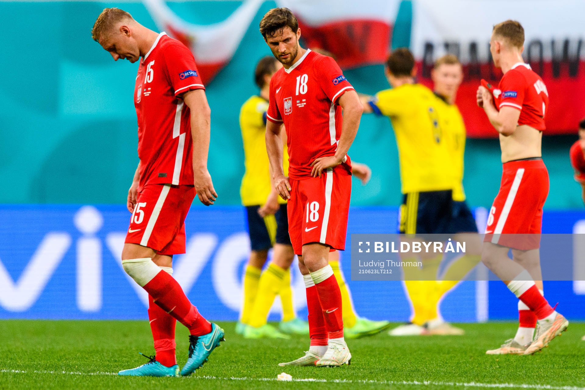 Kamil Glik and Bartosz Bereszynski of Poland looks dejected