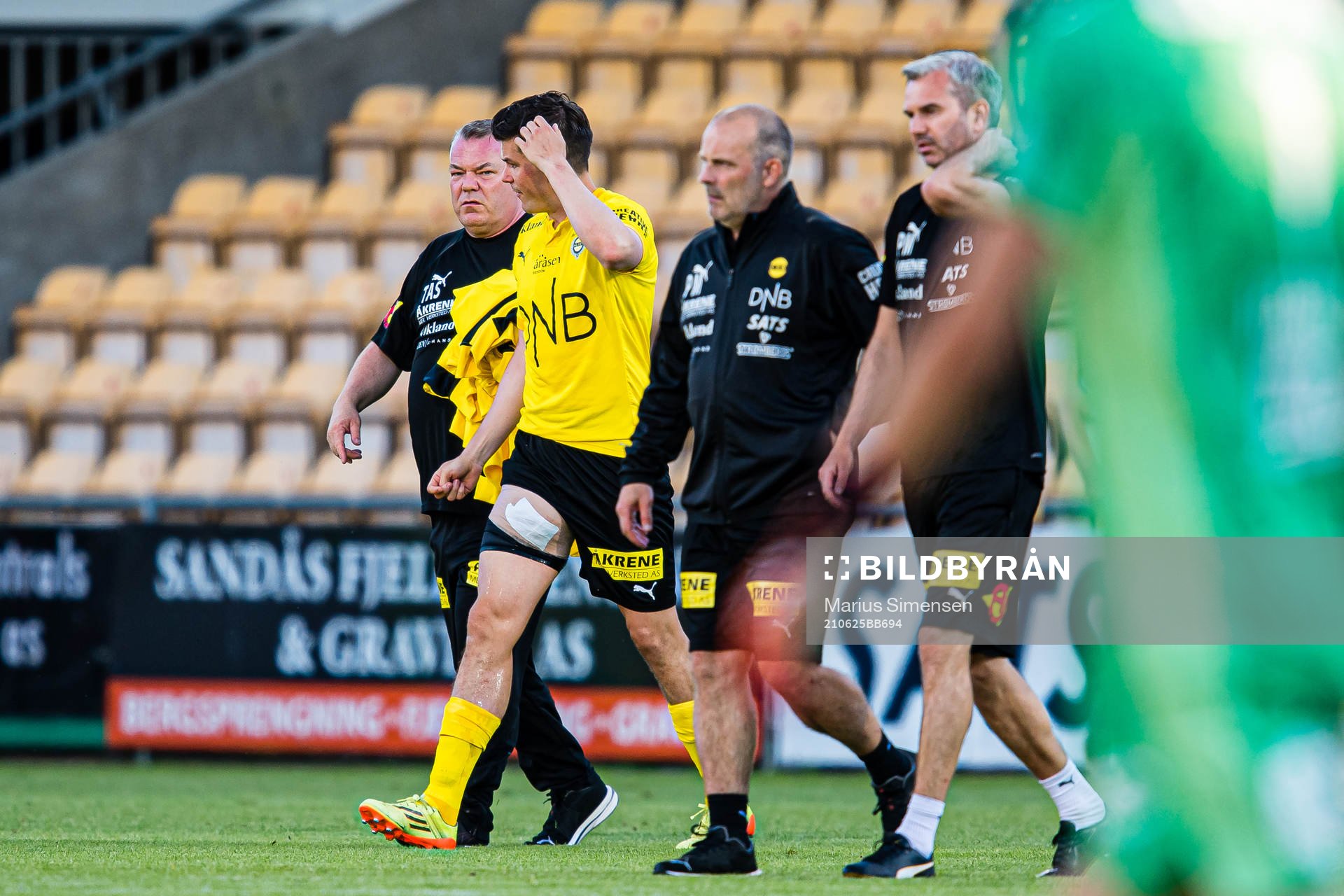 Pål Andre Helland of Lillestrøm walks off the pitch with