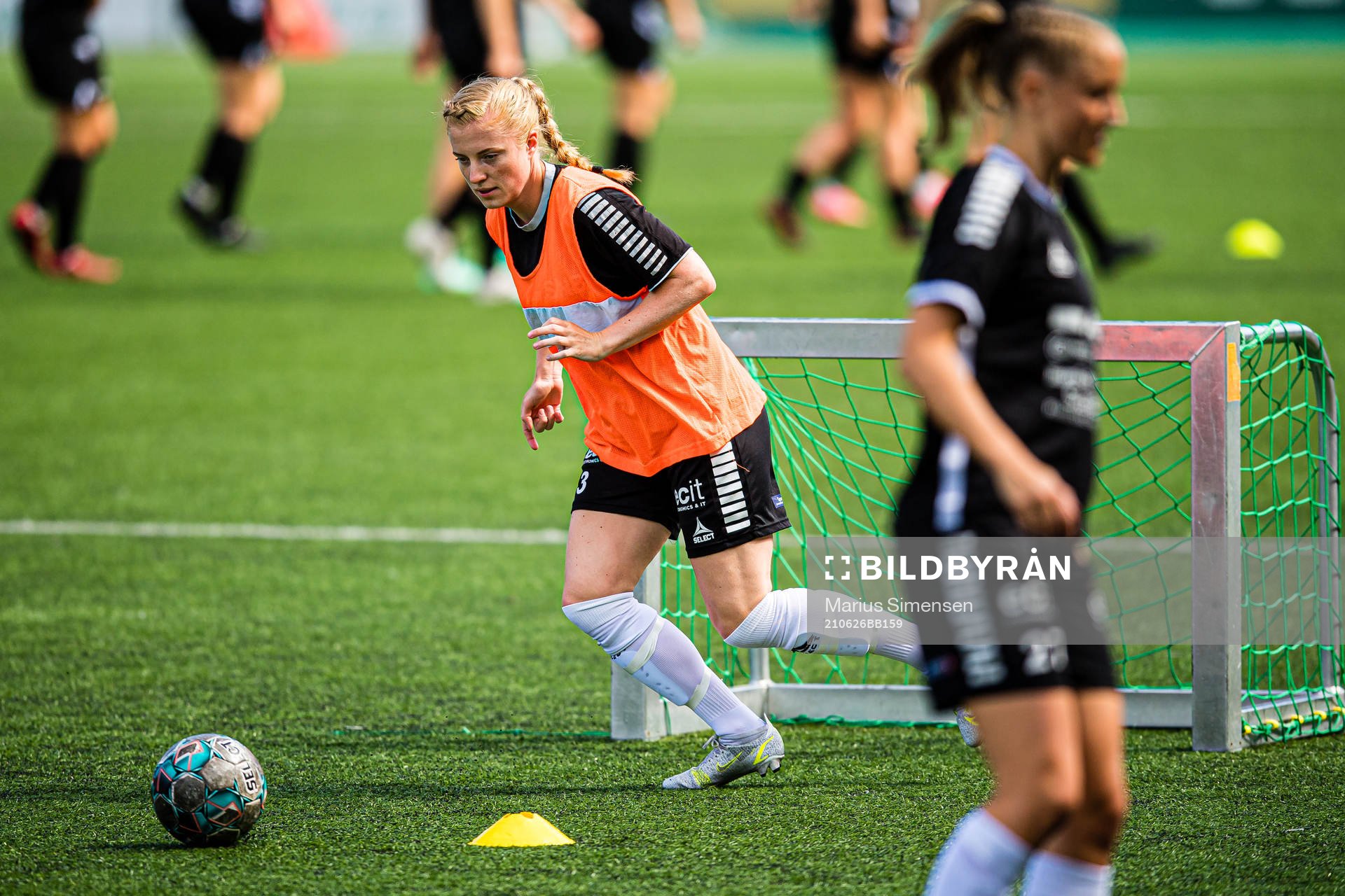 Stina Næss Berge of Hønefoss warms up ahead of the 1. divison football match between Hønefoss and Amazon Grimstad on June 26, 2021 in Hønefoss.