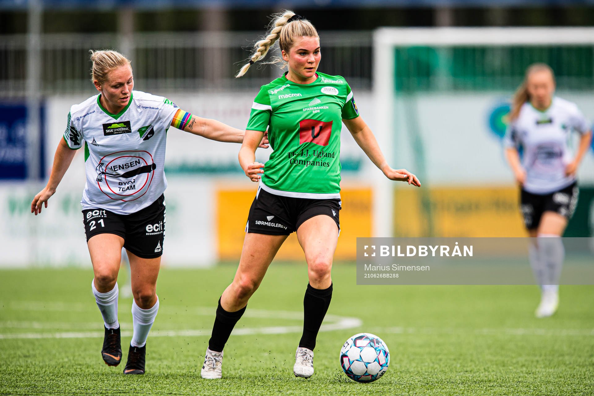 Silje Bekkåsen Nyhagen of Hønefoss and Lisbeth Fredli Rothschild of Amazon Grimstad during the 1. divison football match between Hønefoss and Amazon Grimstad on June 26, 2021 in Hønefoss.