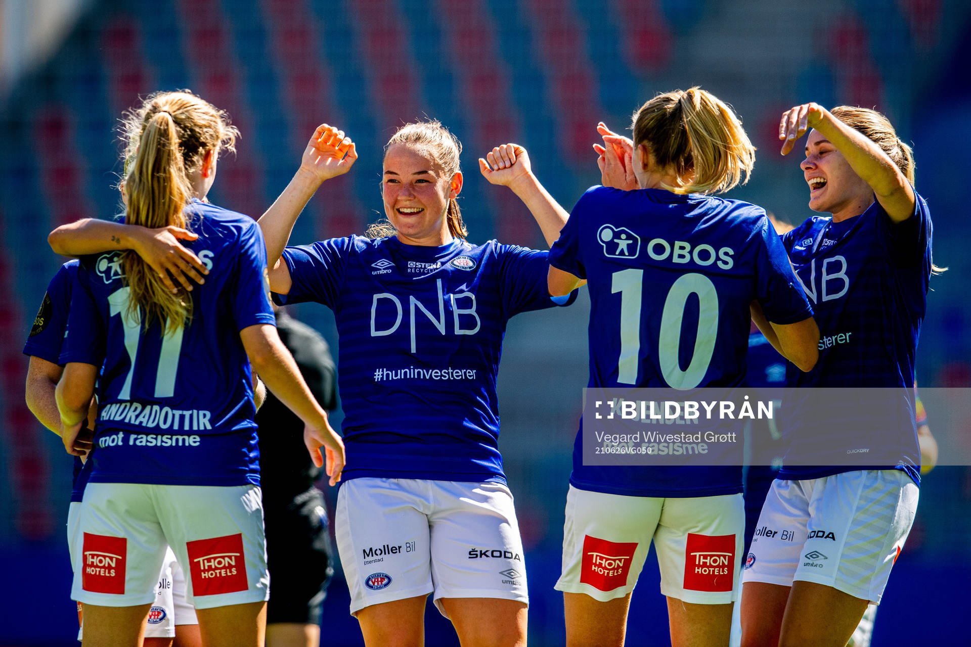 Synne Sofie Kinden Jensen of Vålerenga celebrates with teammates Janni Thomsen and Andrine Tomter after scoring the 3-0 goal during the Toppserien football match between Vålerenga and Klepp on June 26, 2021 in Oslo.