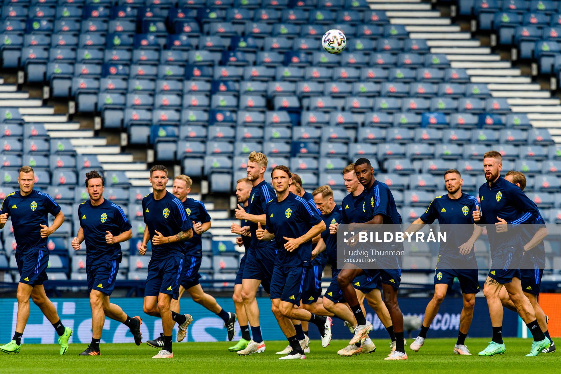 Players of the Swedish national football team warm up