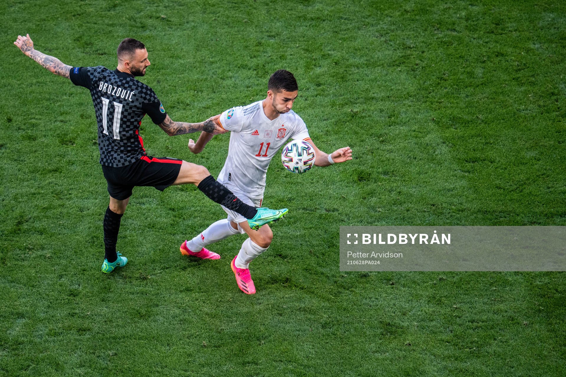 Marcelo Brozovic of Croatia and Ferran Torres of Spain