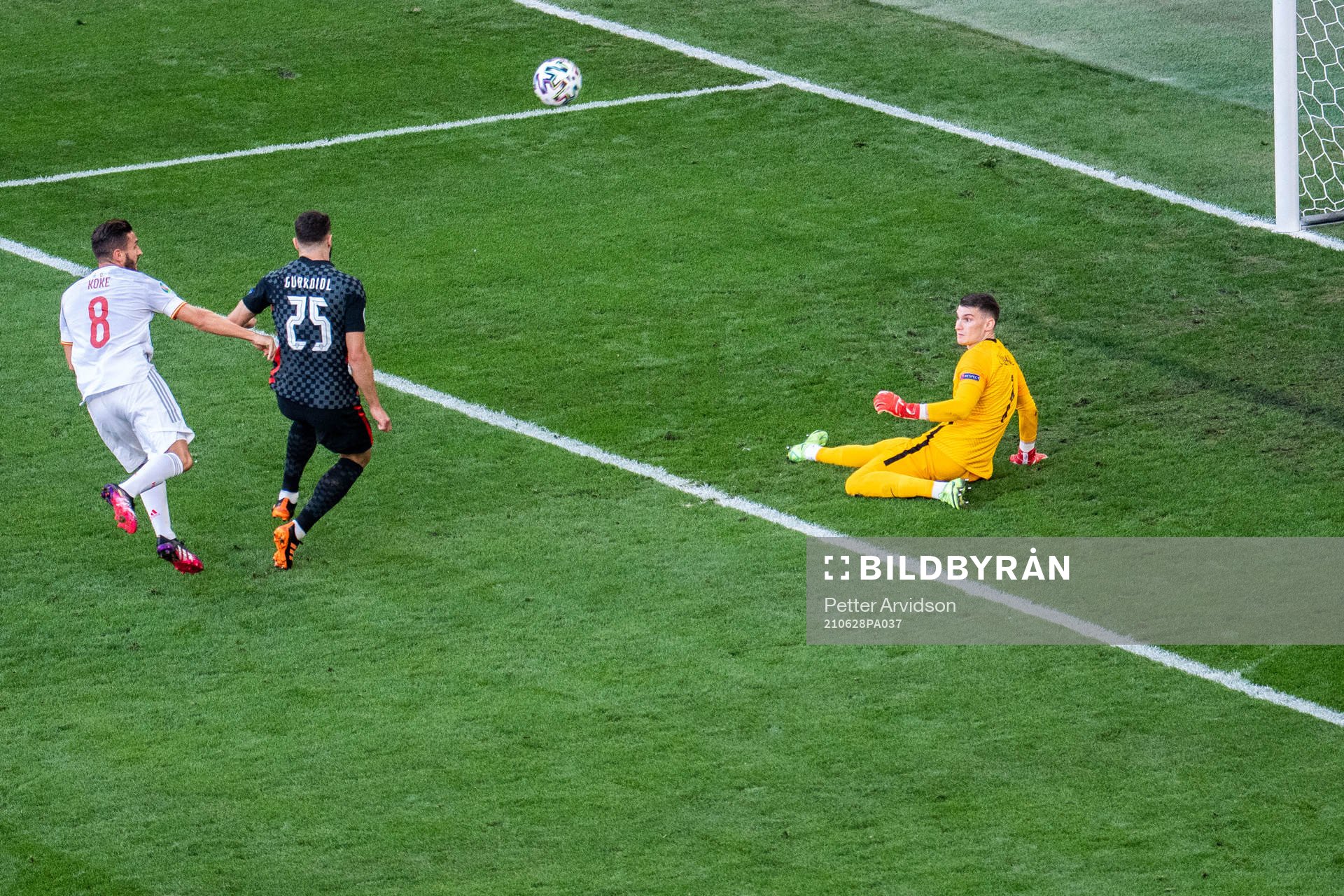 Goalkeeper Dominik Livakovic of Croatia saves a ball from