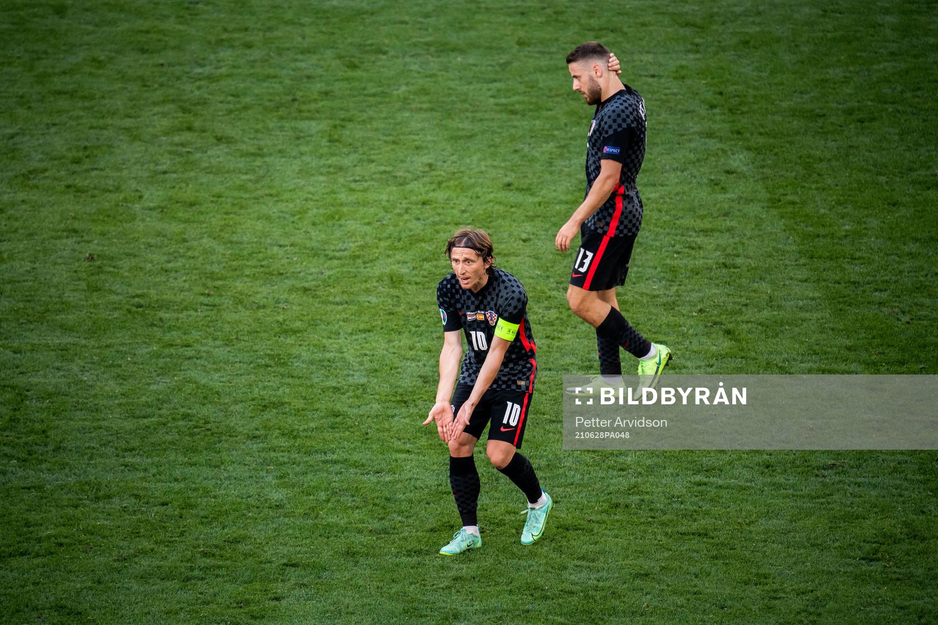 Luka Modric and Nikola Vlasic of Croatia looks dejected