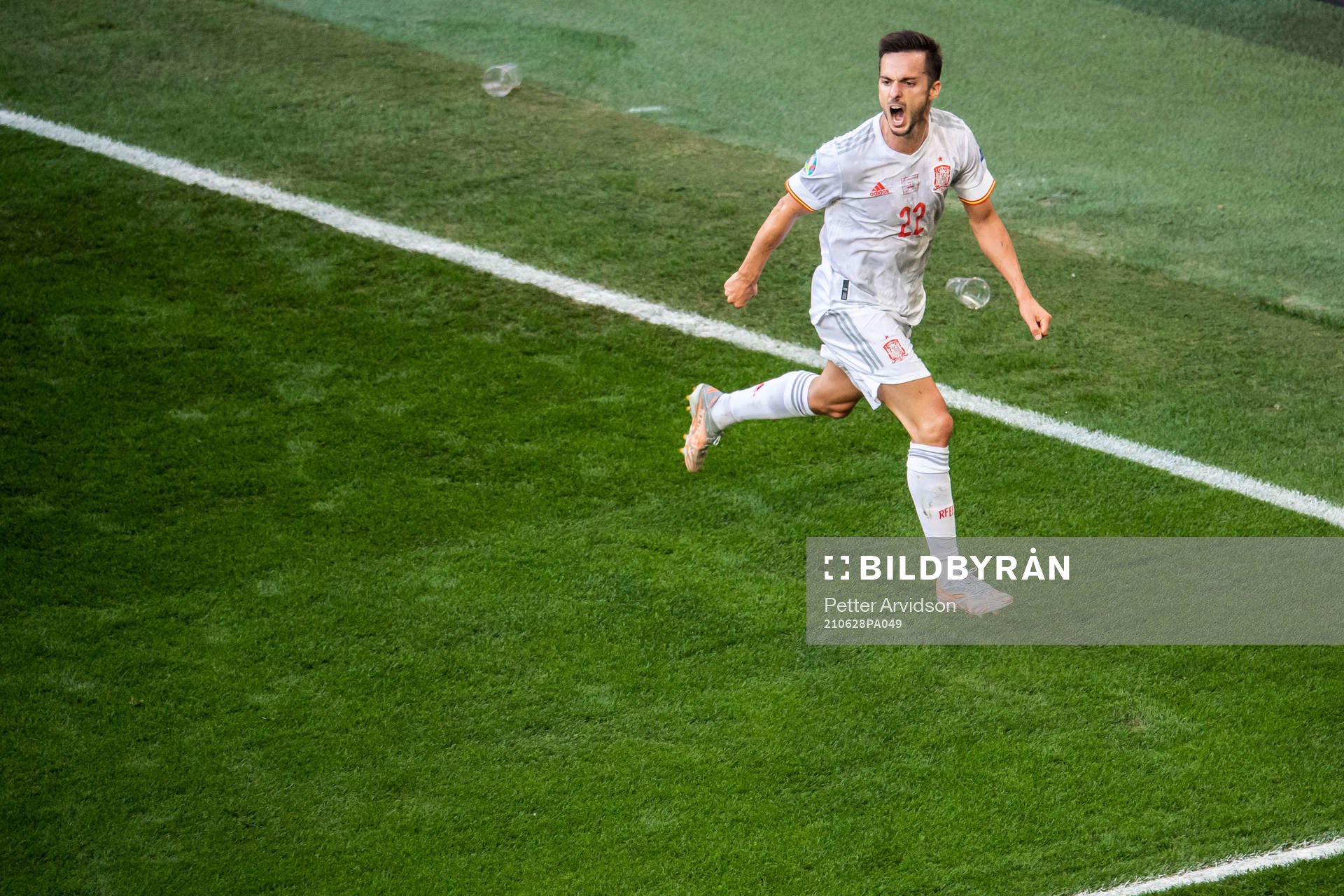 Pablo Sarabia of Spain celebrates scoring 1-1