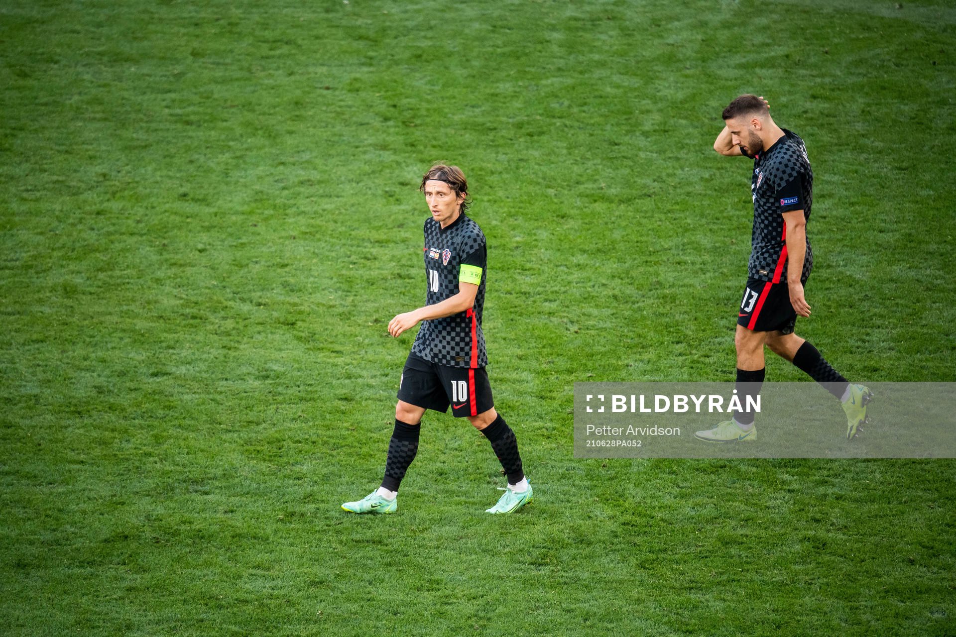 Luka Modric and Nikola Vlasic of Croatia looks dejected