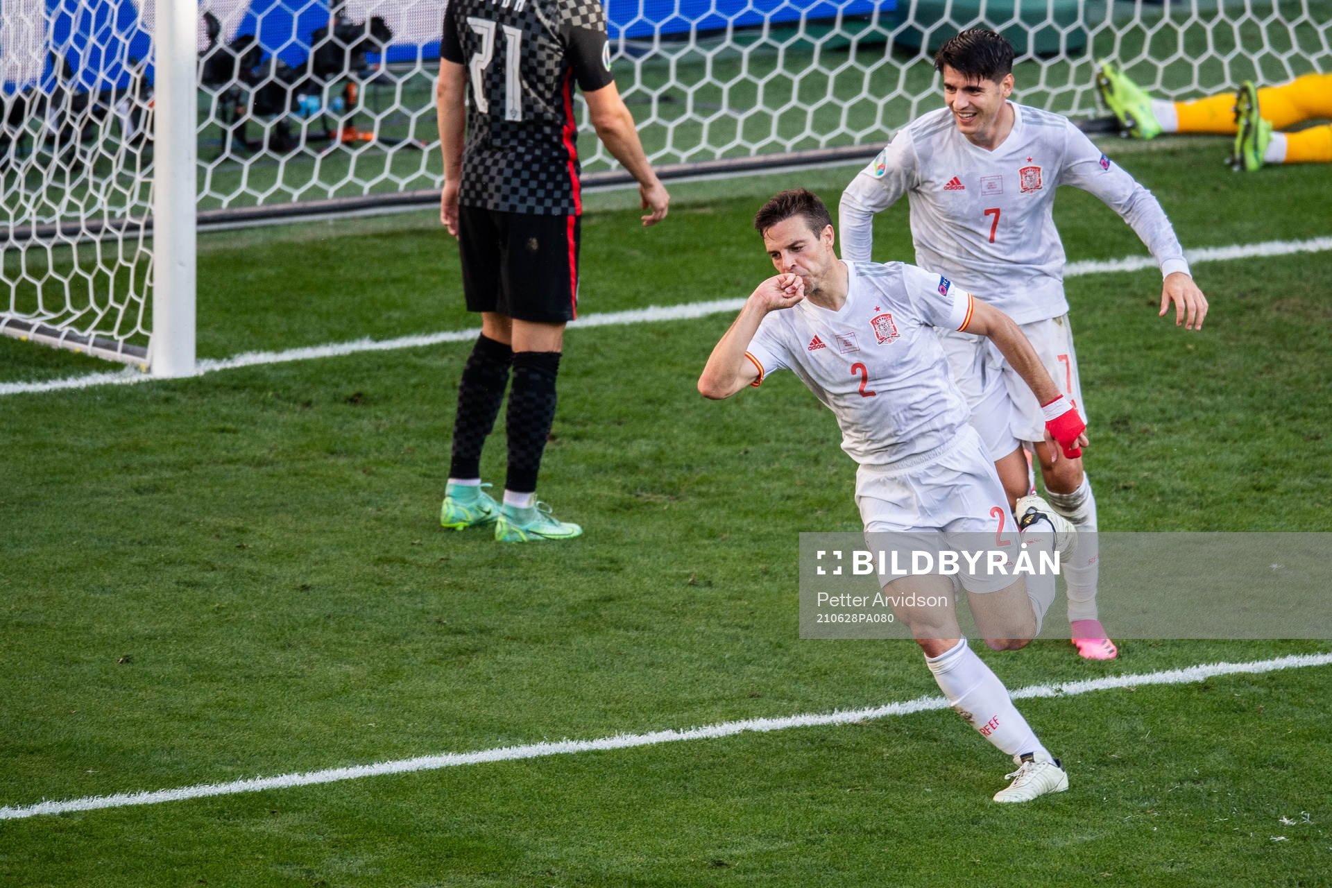 Cesar Azpilicueta and Alvaro Morata of Spain celebrates 1-2