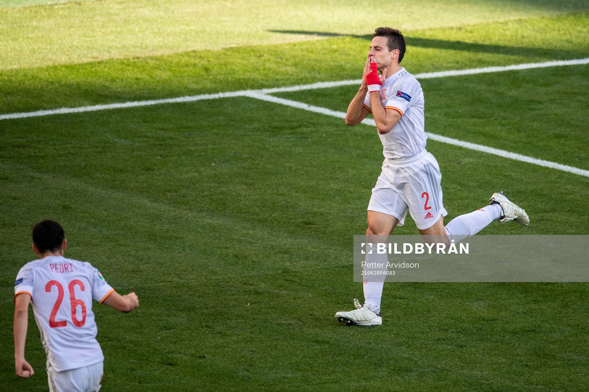 Cesar Azpilicueta of Spain celebrates scoring 1-2