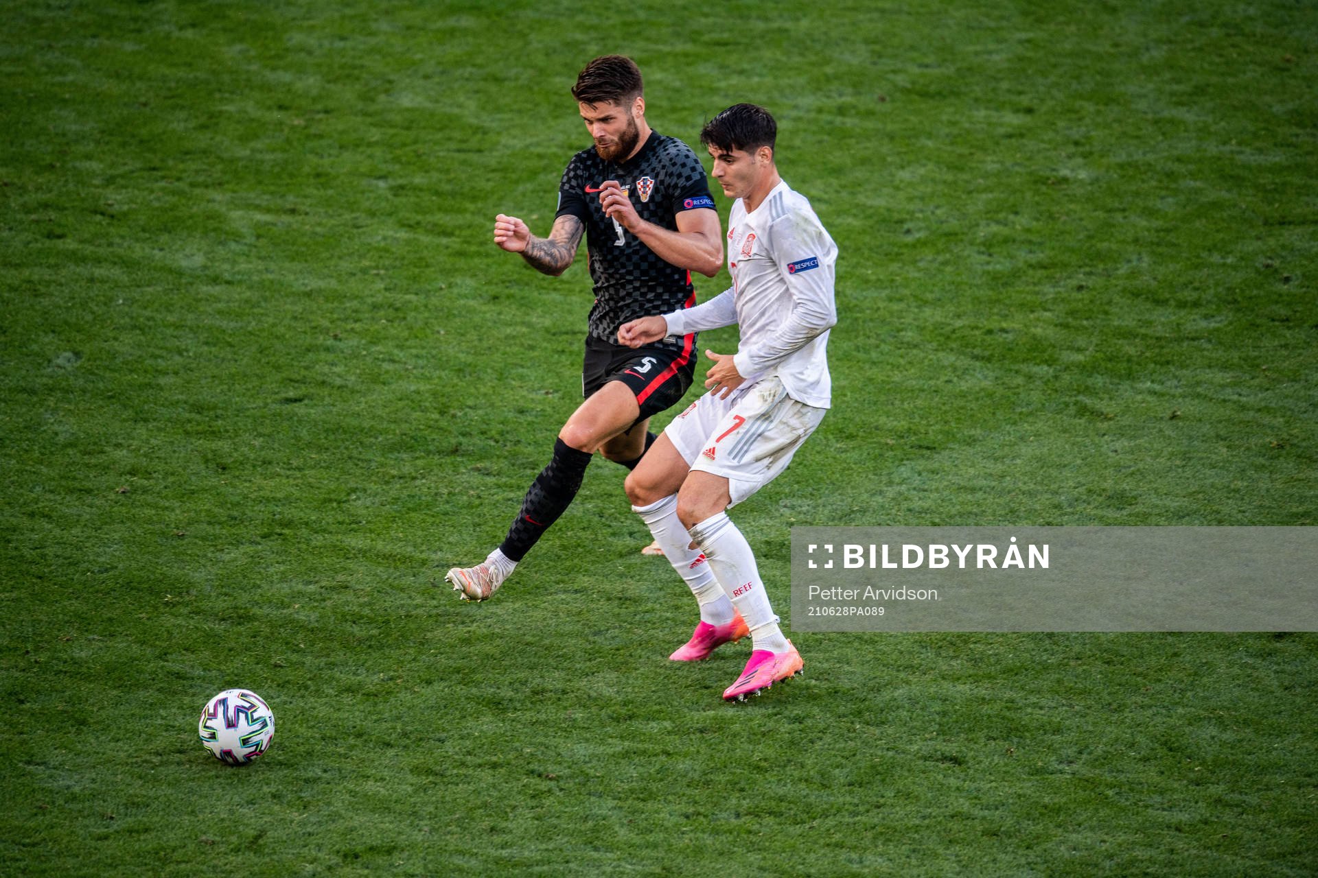 Duje Caleta-Car of Croatia and Alvaro Morata of Spain