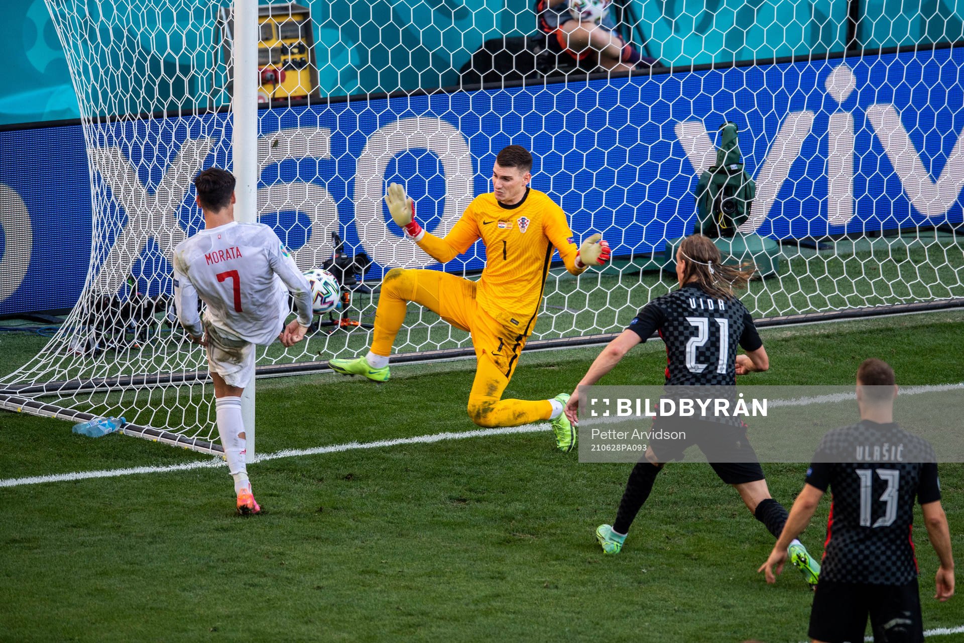 Alvaro Morata of Spain scores 1-3 (offside) behind