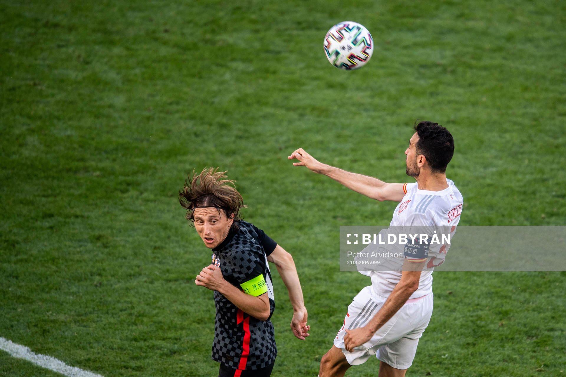 Luka Modric of Croatia and Sergio Busquets of Spain