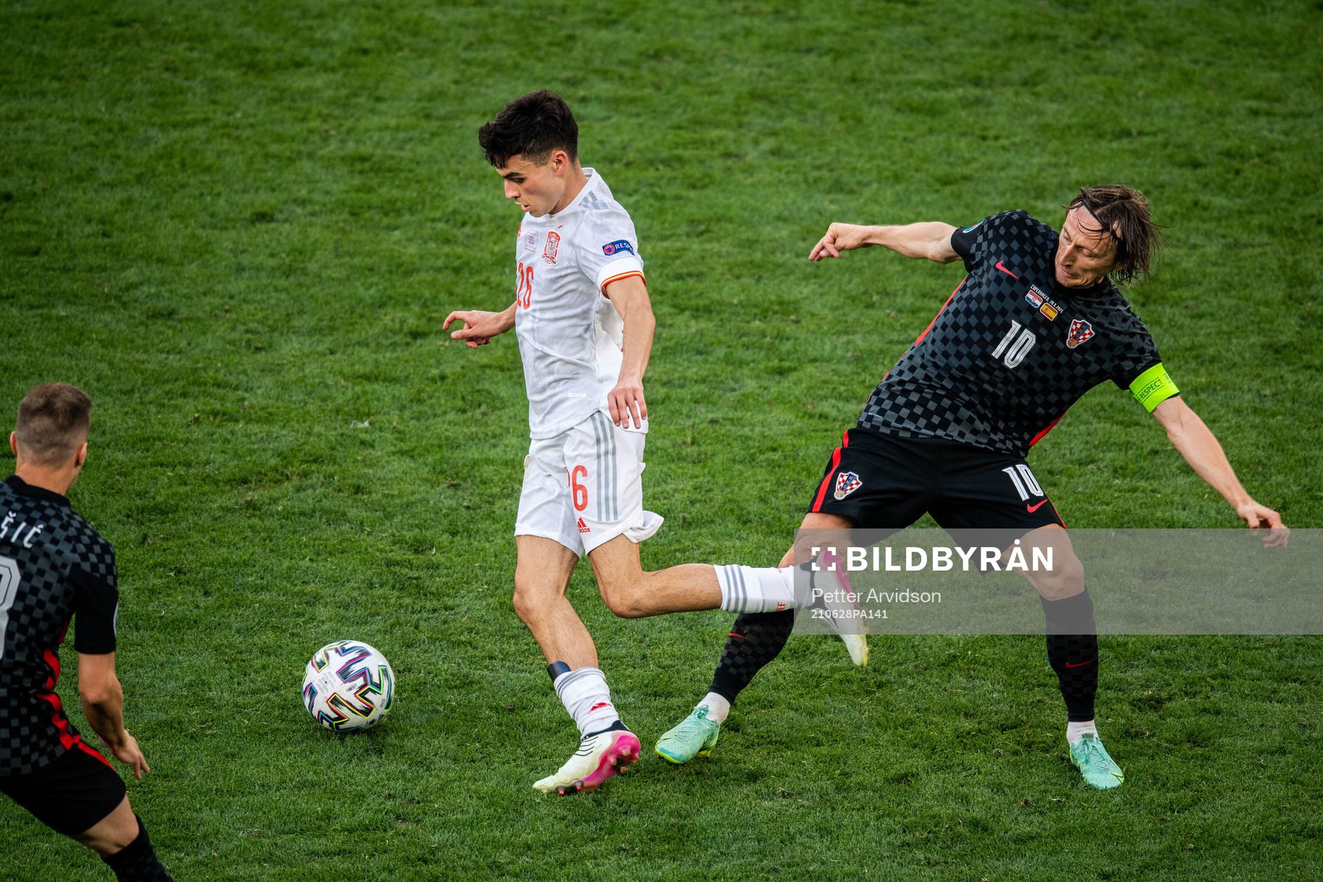 Pedri Pedri of Spain and Luka Modric of Croatia