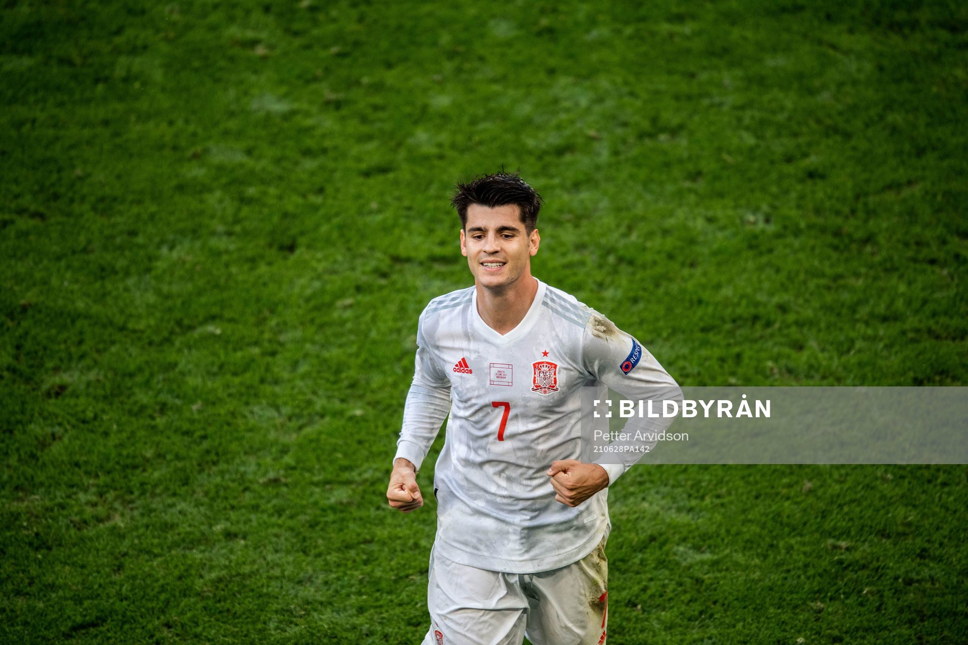 Alvaro Morata of Spain celebrates scoring 3-4