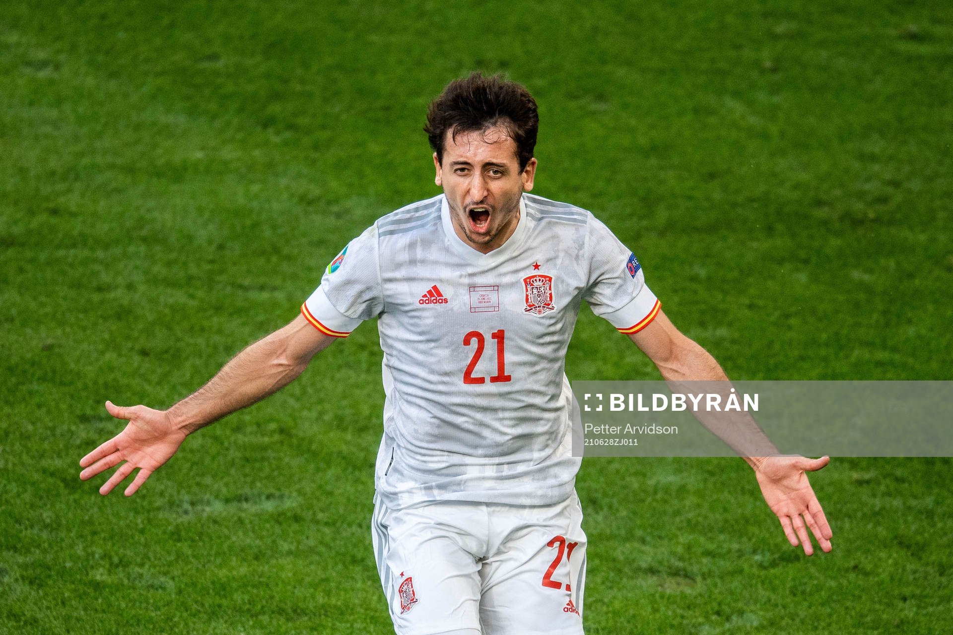 Mikel Oyarzabal of Spain celebrates scoring 3-5