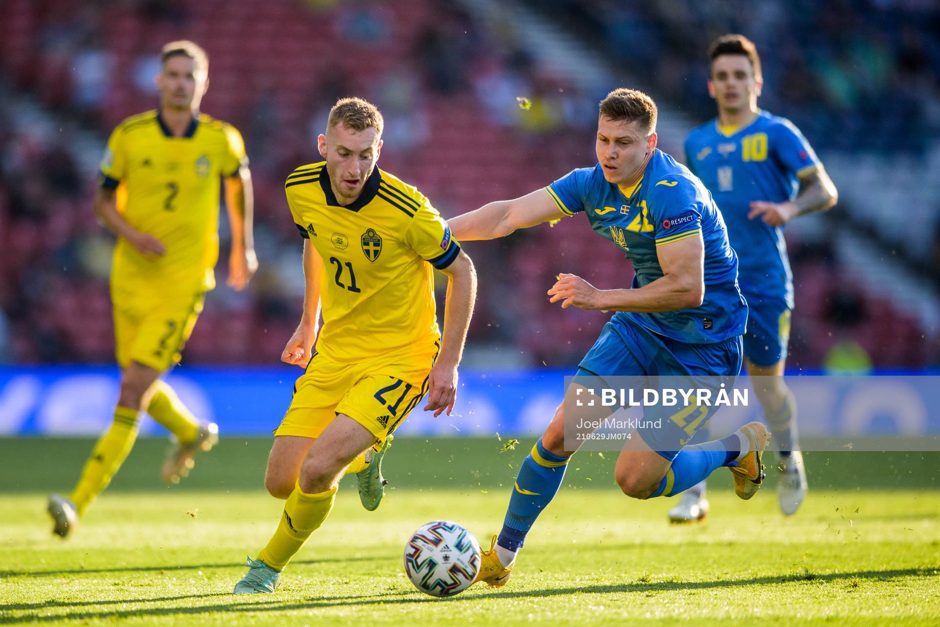 Dejan Kulusevski of Sweden and Mykola Matviyenko of Ukraine