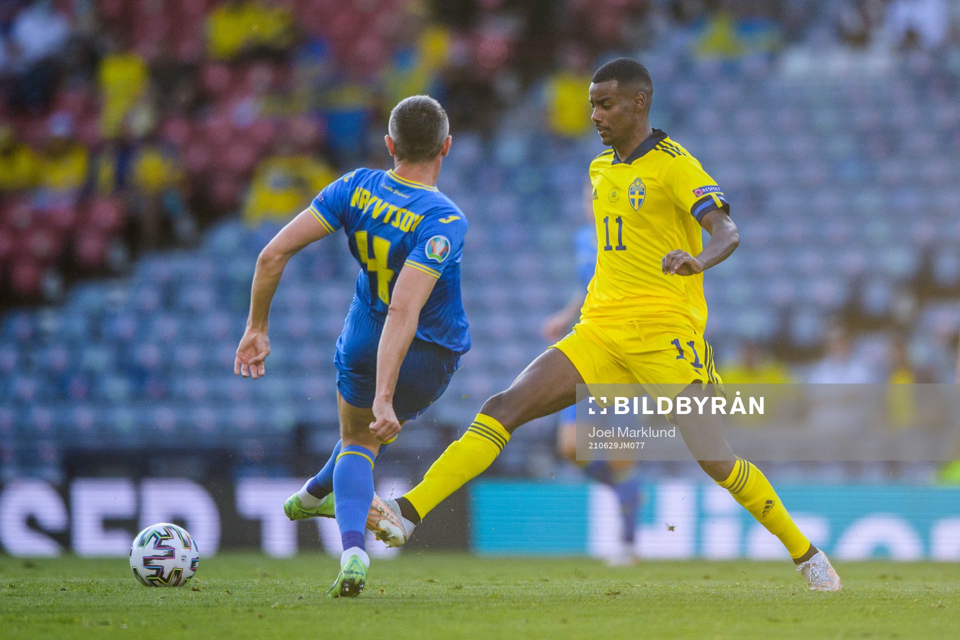 Serhiy Kryvtsov of Ukraine and Alexander Isak of Sweden