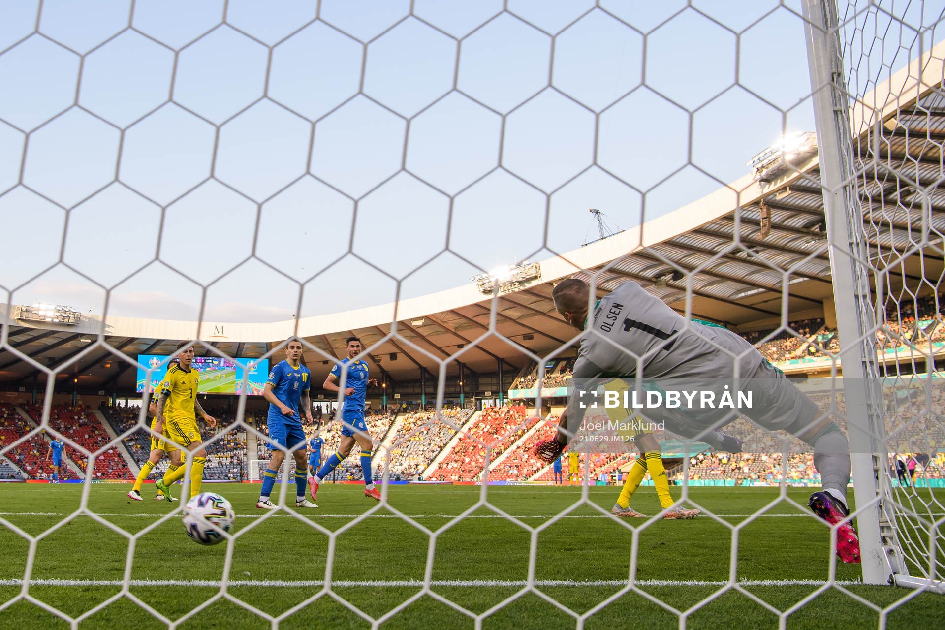 Goalkeeper Robin Olsen of Sweden lets in the 0-1 goal