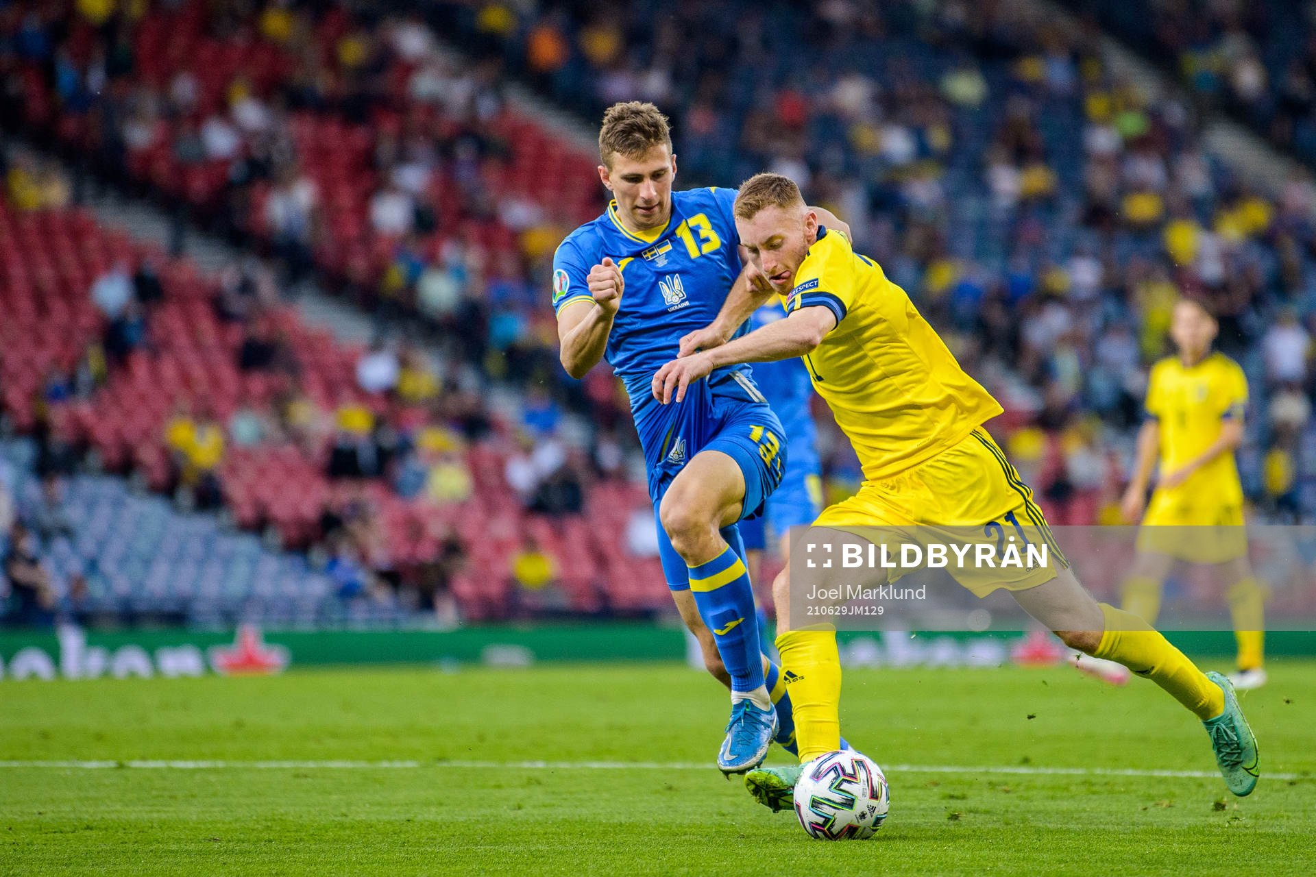 Illia Zabarnyi of Ukraine against Dejan Kulusevski of Sweden during the UEFA Euro 2020 Football Championship round of 16 match between Sweden and Ukraina on June 29, 2021 in Glasgow.