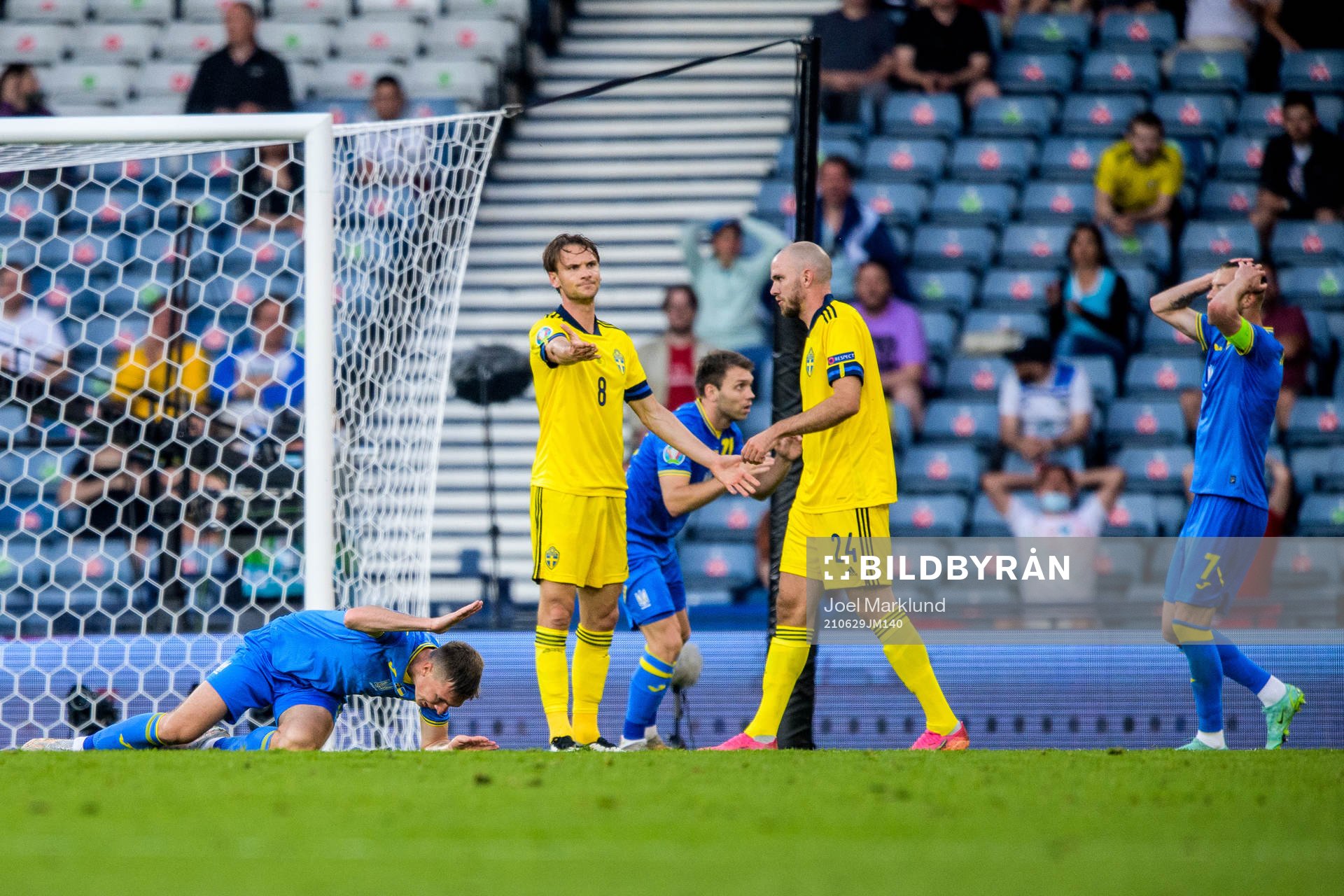 Serhiy Sydorchuk of Ukraine looks dejected next to Albin