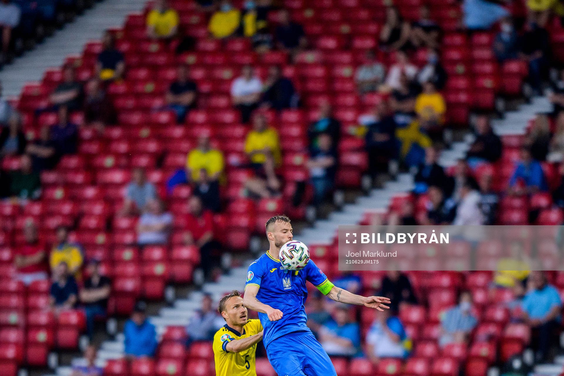Pierre Bengtsson of Sweden and Andriy Yarmolenko of Ukraine