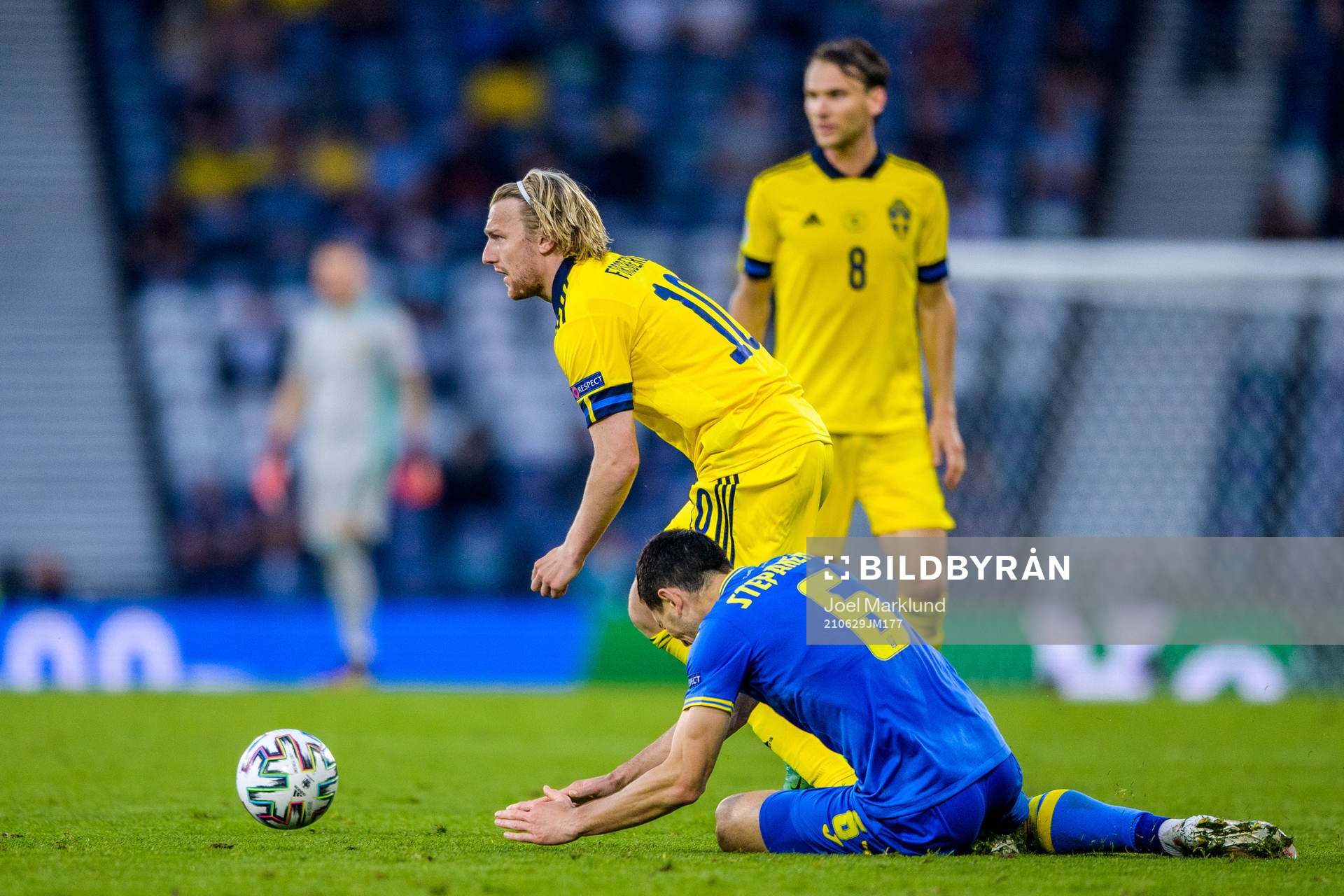 Emil Forsberg of Sweden and Taras Stepanenko of Ukraine
