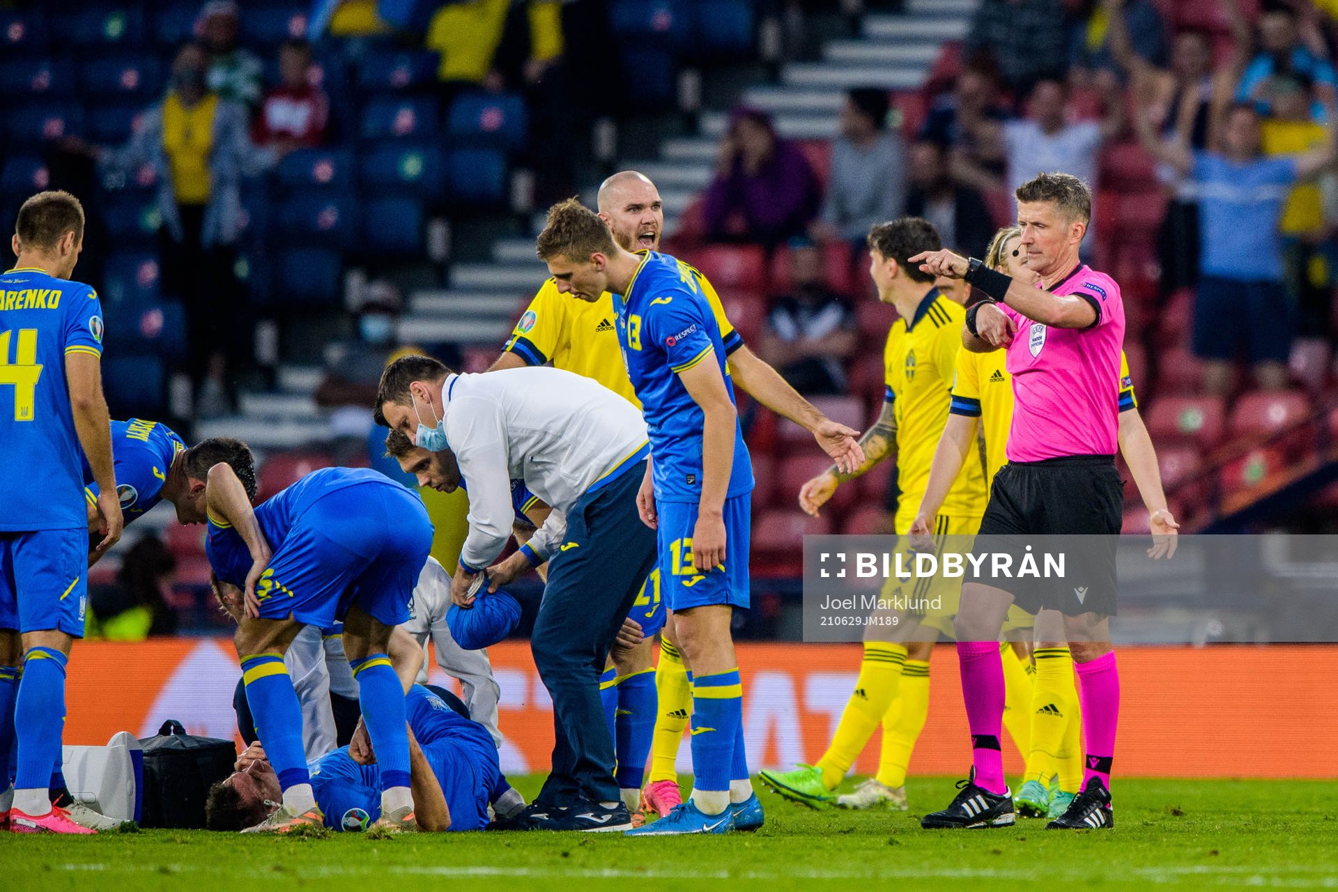 Marcus Danielson of Sweden receives a red card from referee