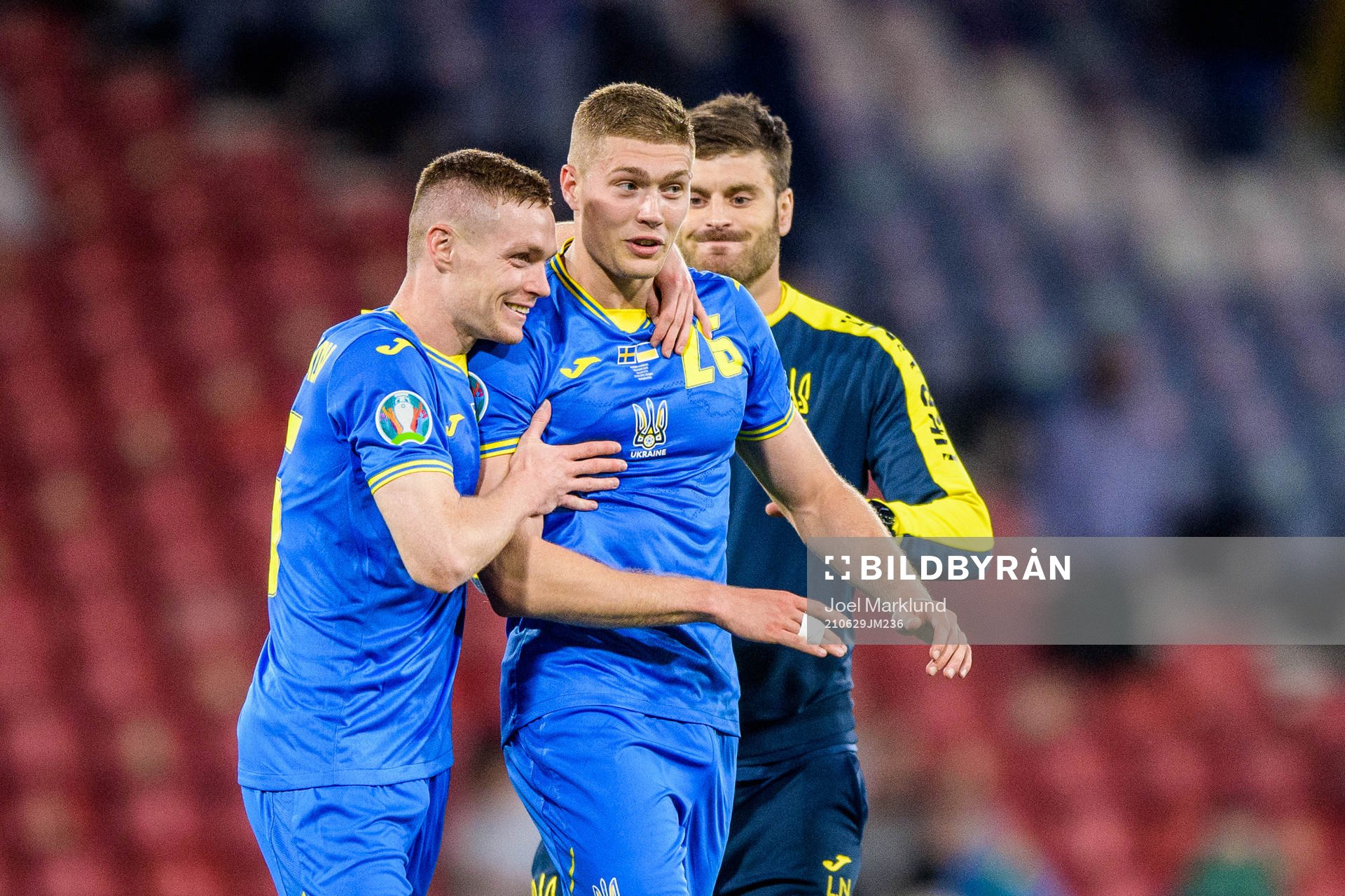 Viktor Tsygankov and Artem Dovbyk of Ukraine celebrate