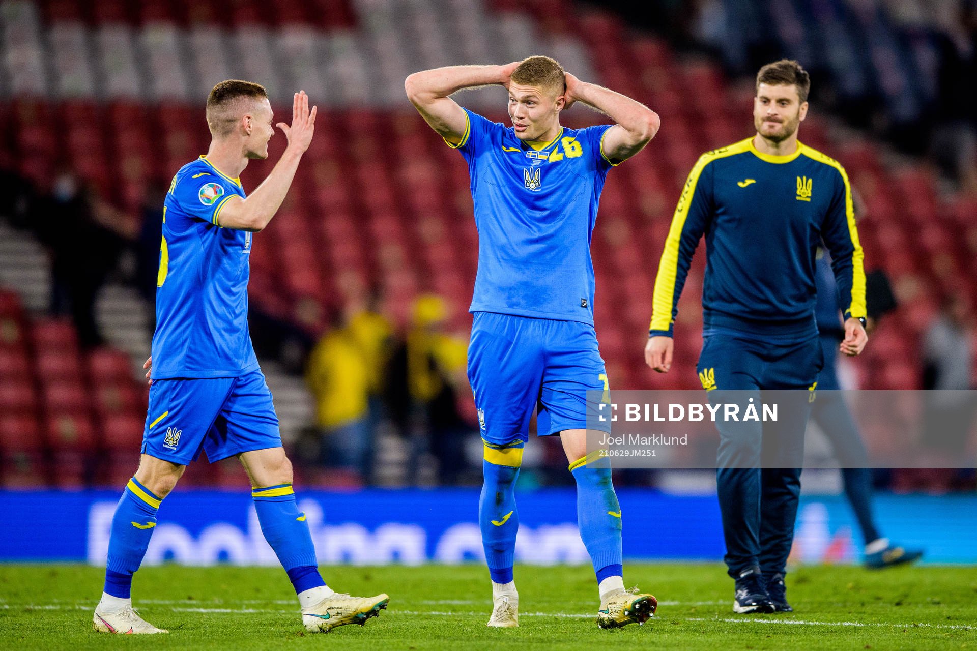 Viktor Tsygankov and Artem Dovbyk of Ukraine celebrate
