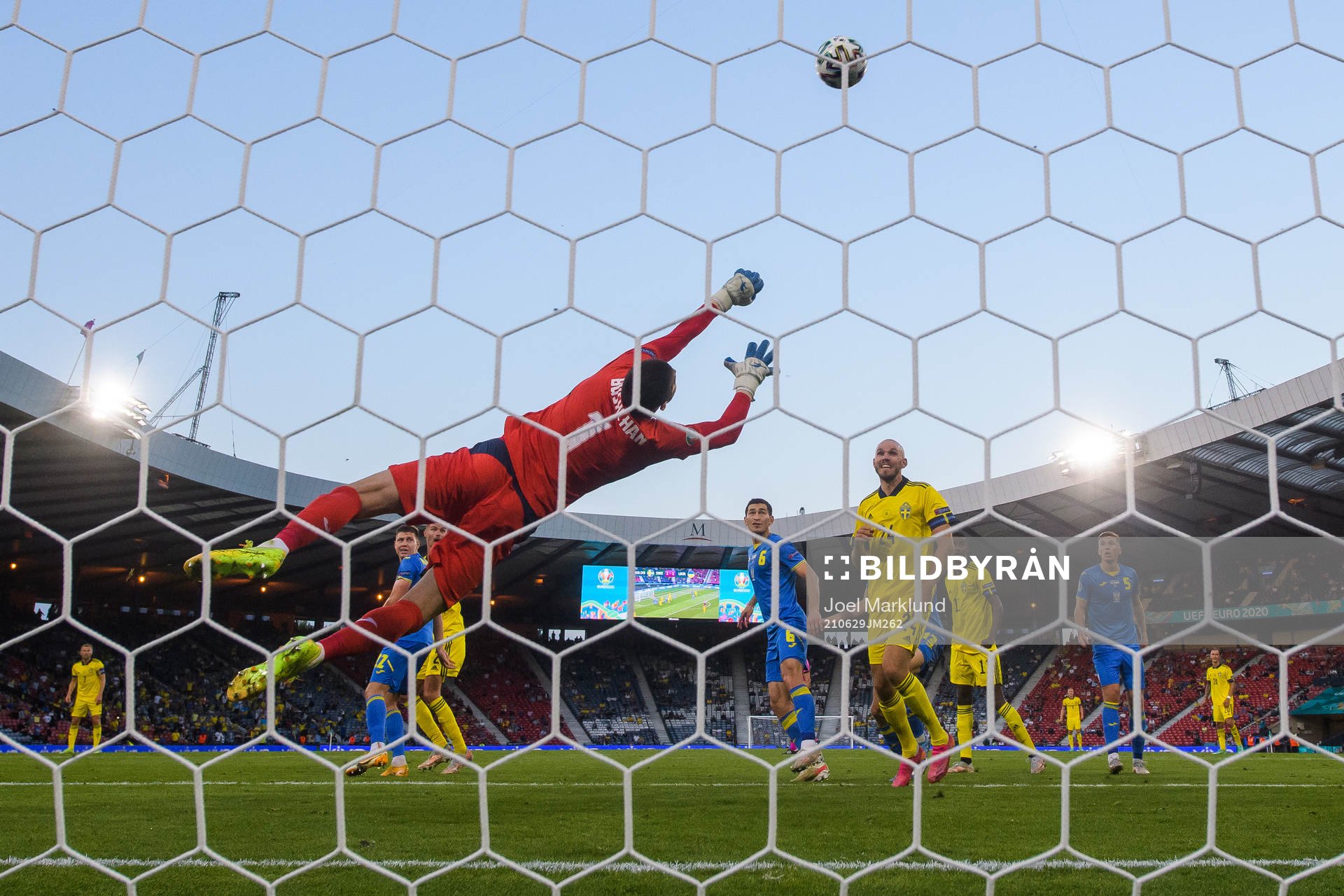 Goalkeeper Georgiy Bushchan of Ukraine makes a save in