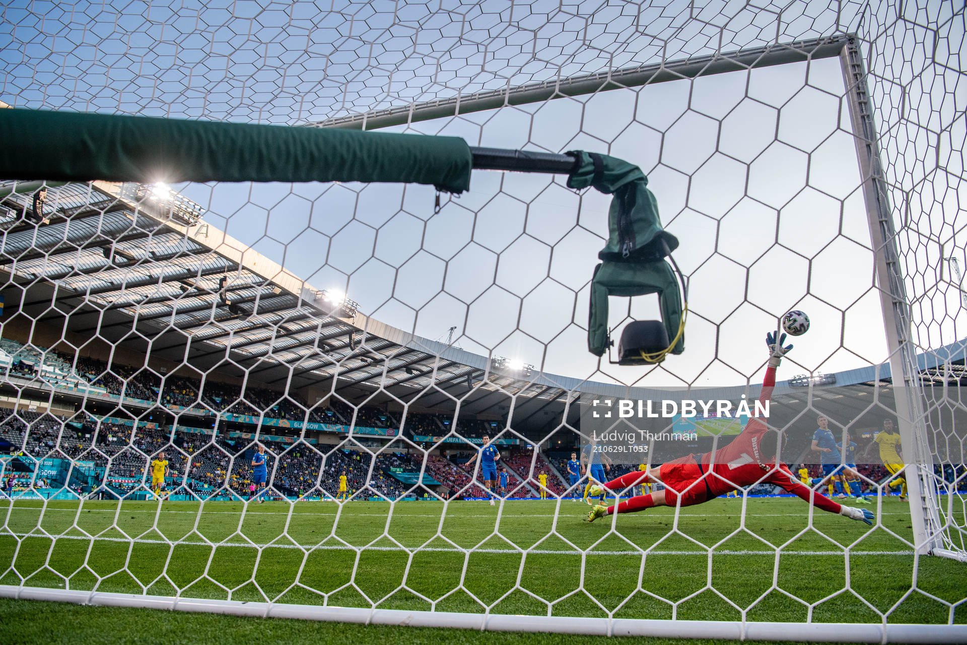 Emil Forsberg of Sweden scores 1-1 behind goalkeeper