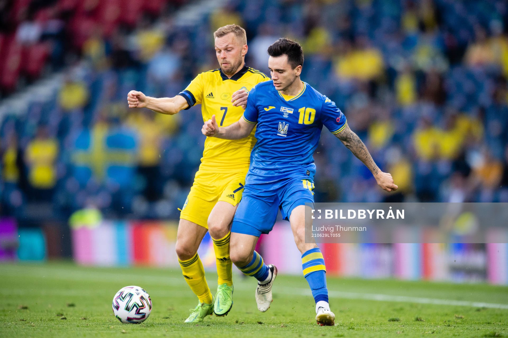Sebastian Larsson of Sweden and Mykola Shaparenko of Ukraine