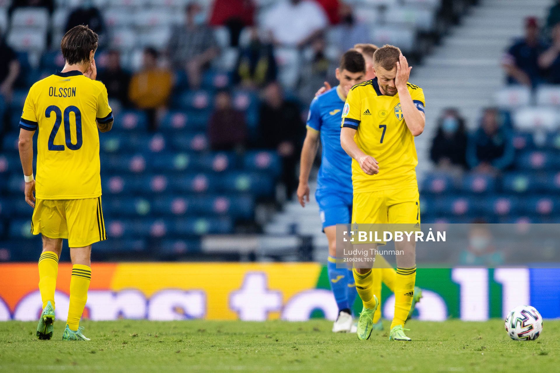 Sebastian Larsson of Sweden looks dejected