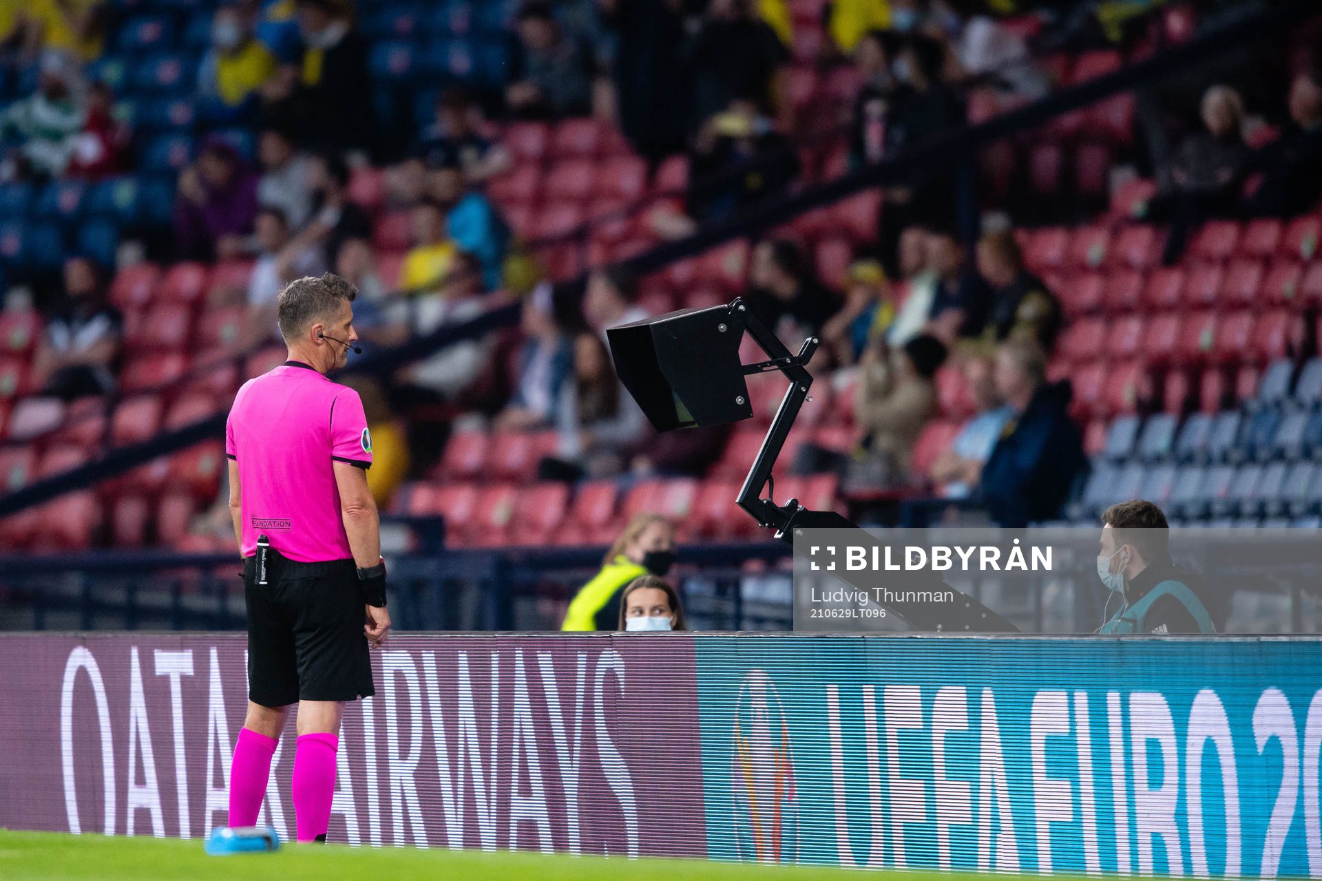 Referee Daniele Orsato do a VAR-check