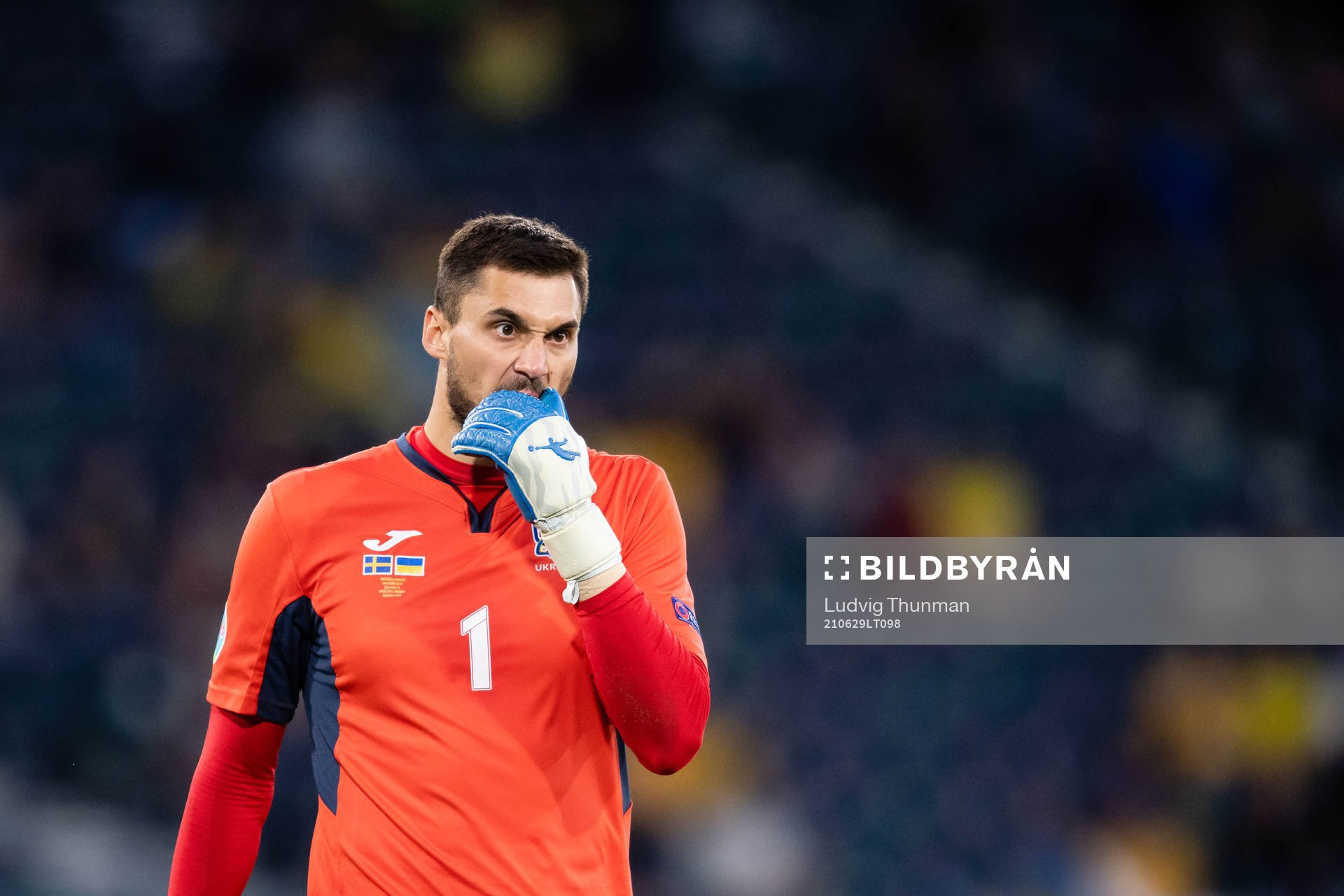 Goalkeeper Georgiy Bushchan of Ukraine looks dejected