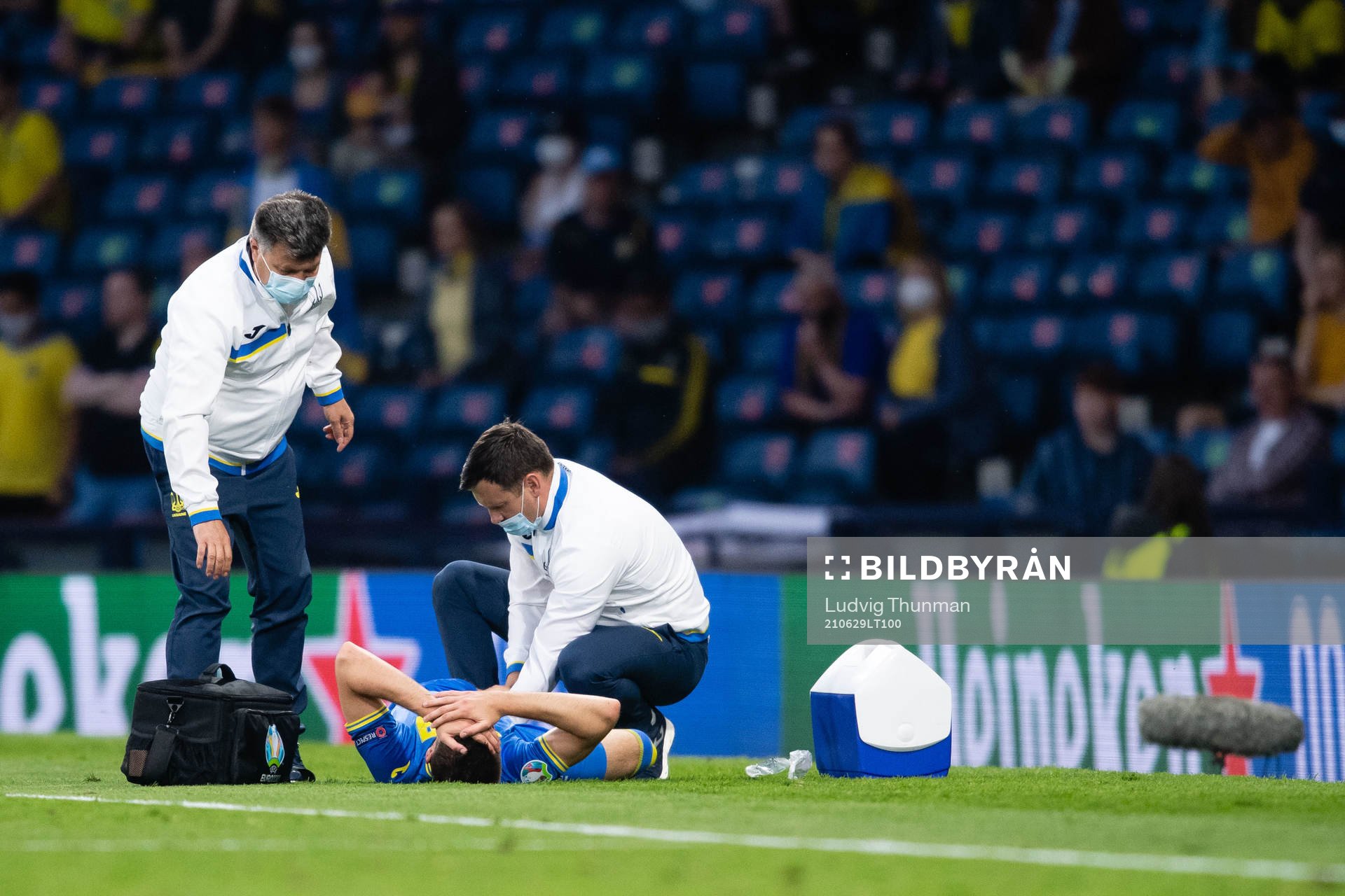 Artem Besedin of Ukraine in pain during the UEFA Euro 2020 Football Championship round of 16 match between Sweden and Ukraina on June 29, 2021 in Glasgow.