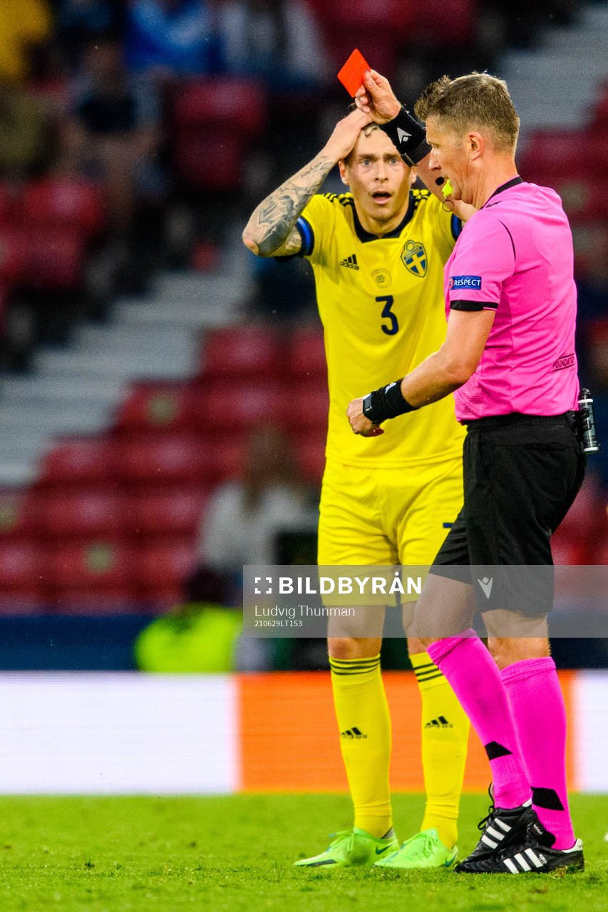 Victor Nilsson Lindelöf of Sweden reacts to a red card