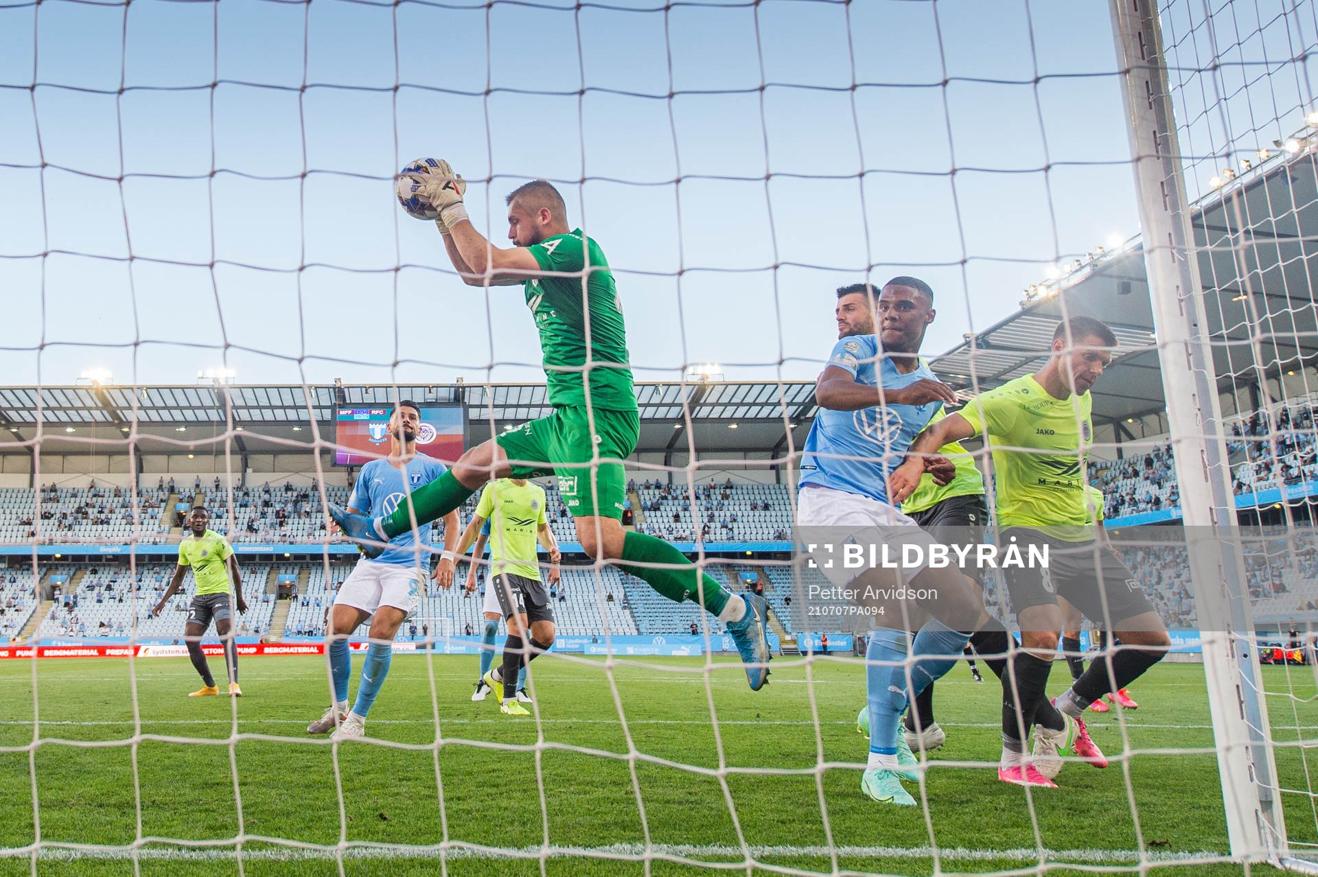 Goalkeeper Roberts Ozols of Riga and Amin Sarr of Malmö FF