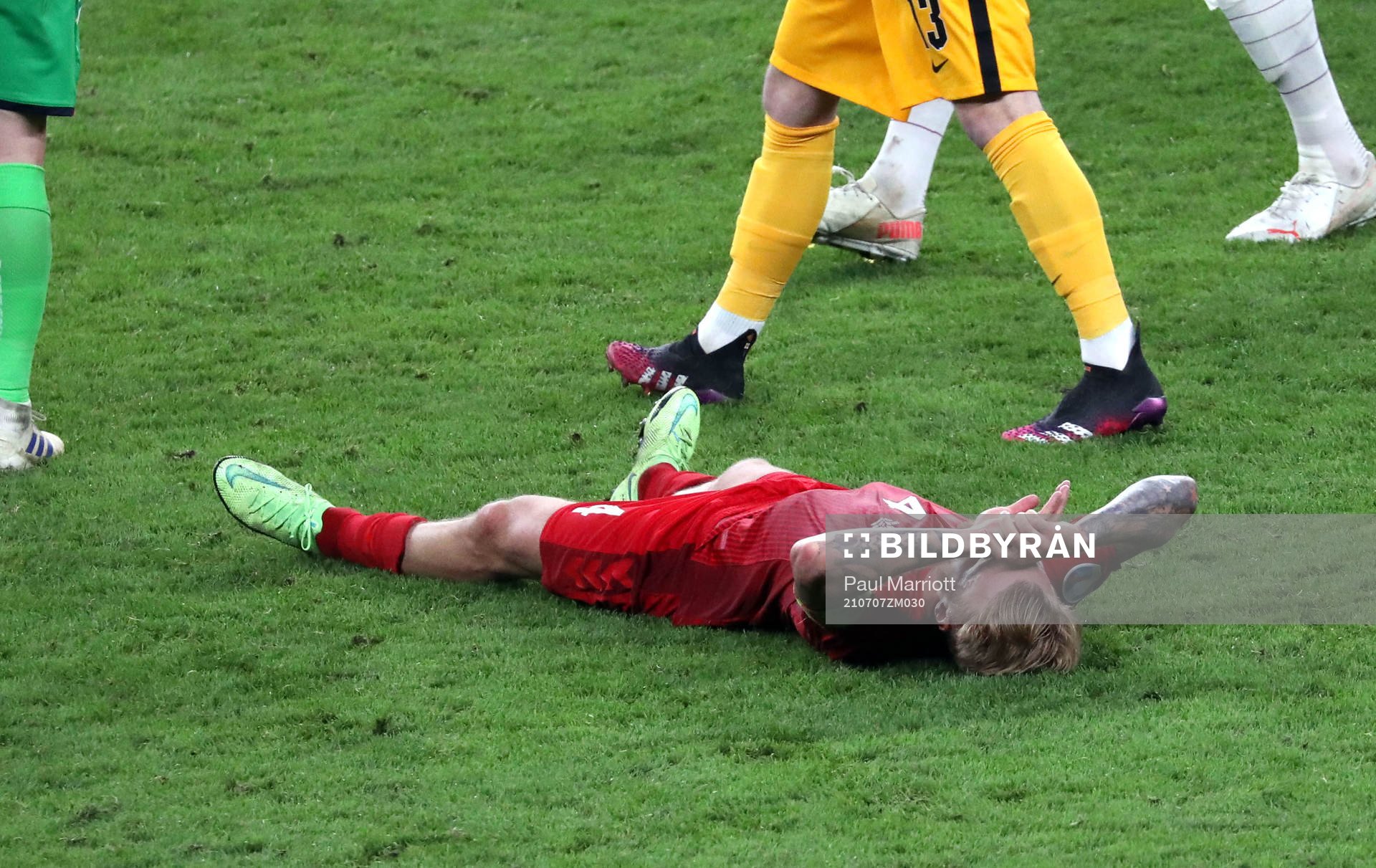 Simon Kjær of Denmark looks dejected