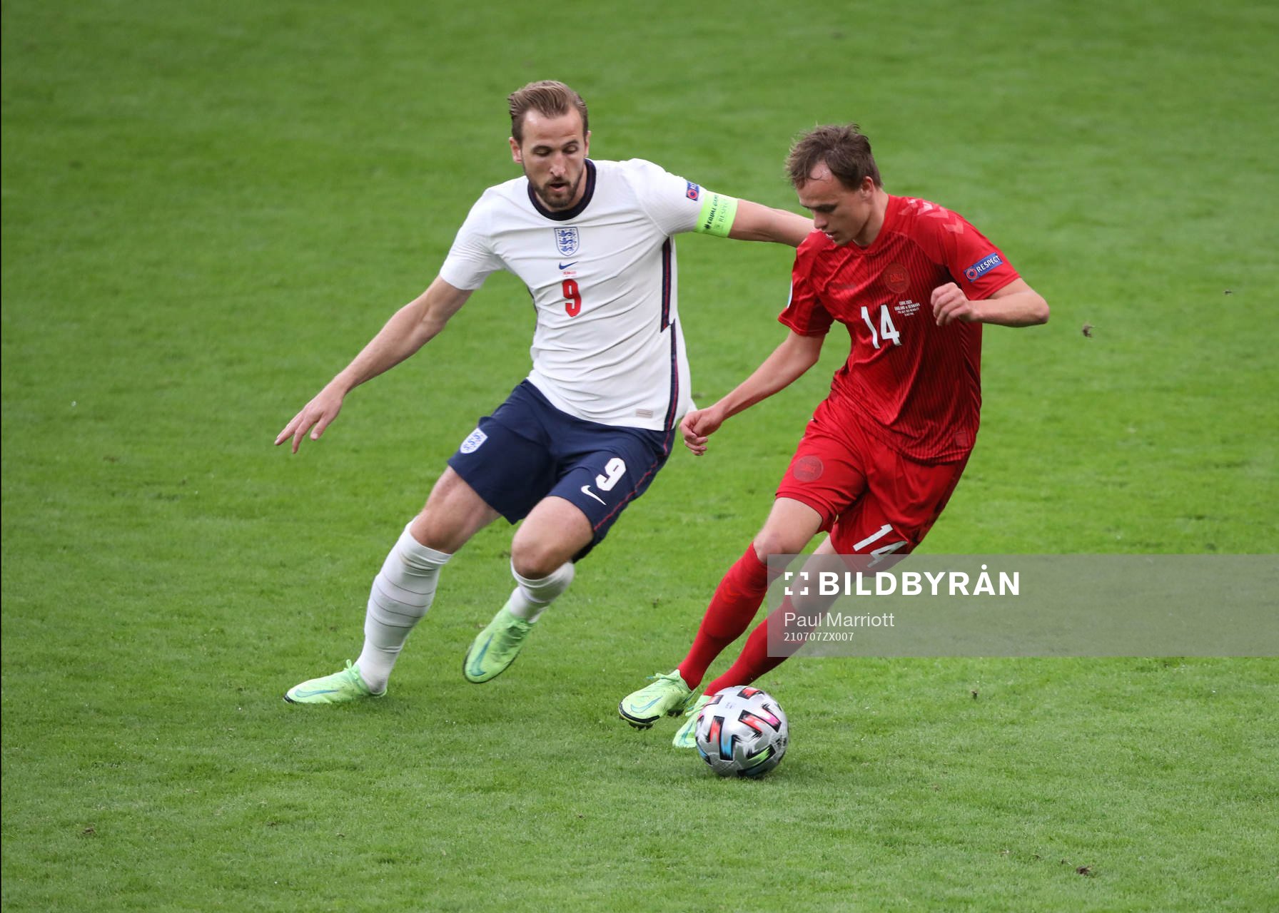 Mikkel Damsgaard of Denmark and Harry Kane of England