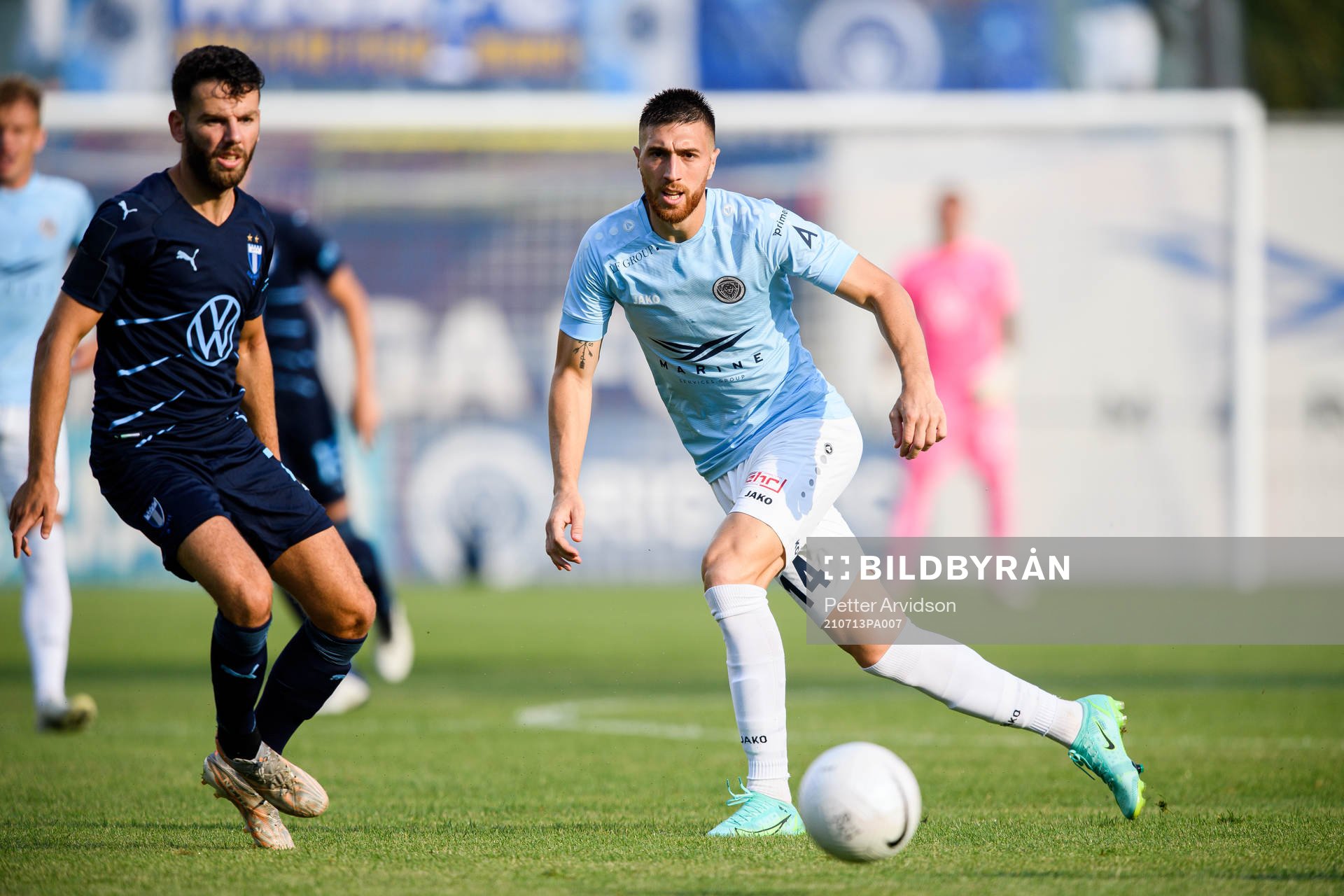 Erdal Rakip of Malmö FF and Nedeljko Piscevic of Riga
