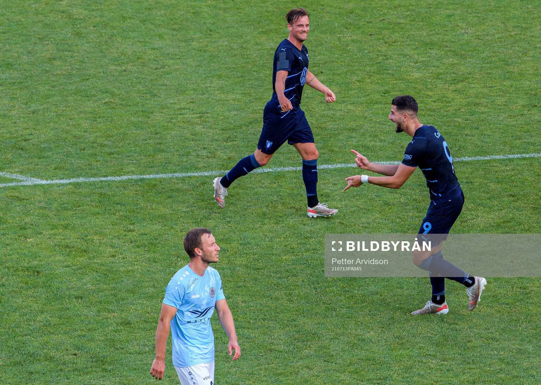 Eric Larsson and Antonio Colak of Malmö FF celebrate the 0-1 goal during the UEFA Champions League qualifying match between Riga and Malmö FF on July 13, 2021 in Riga.