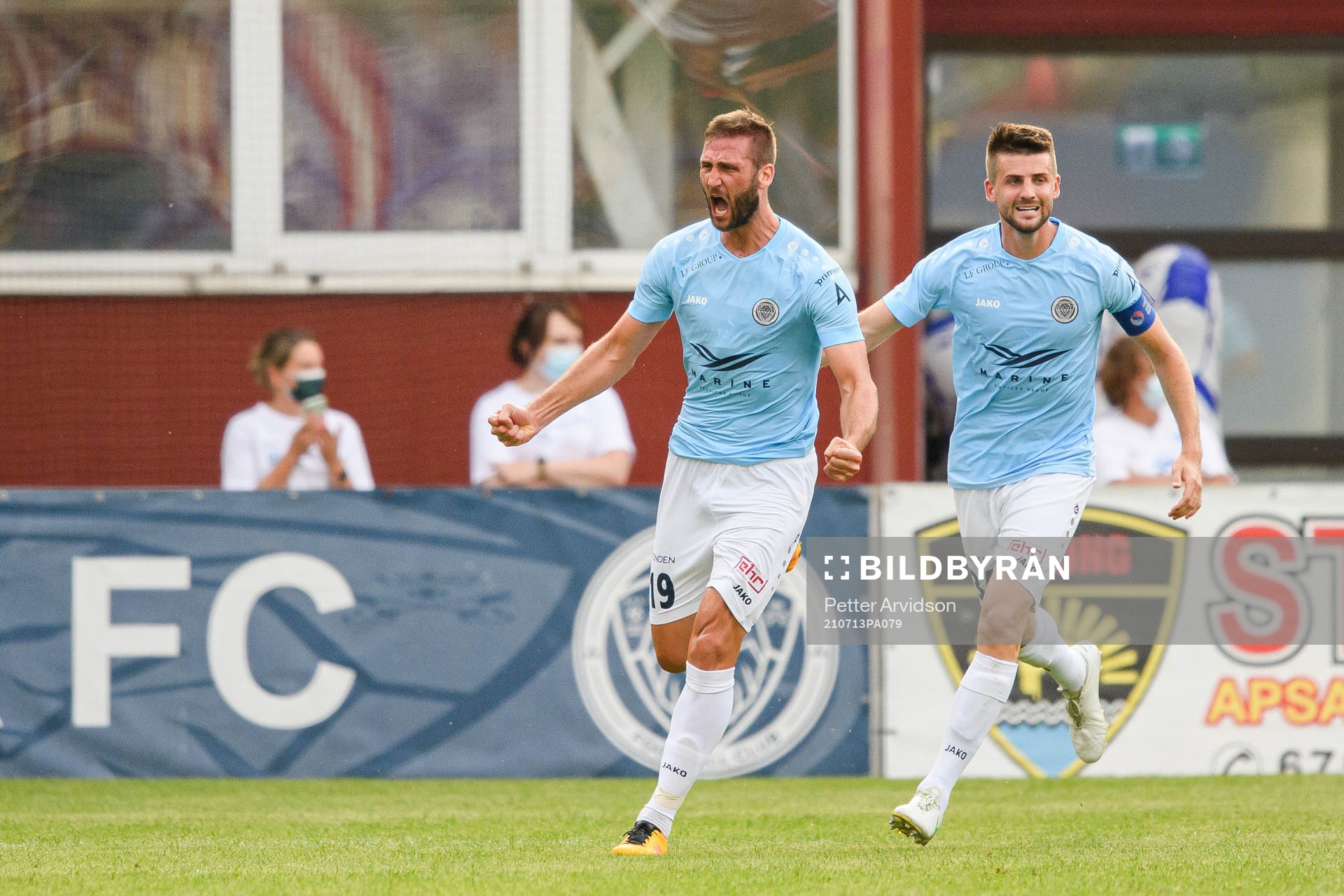 Ivan Paurevic and Nedeljko Piscevic of Riga celebrate the