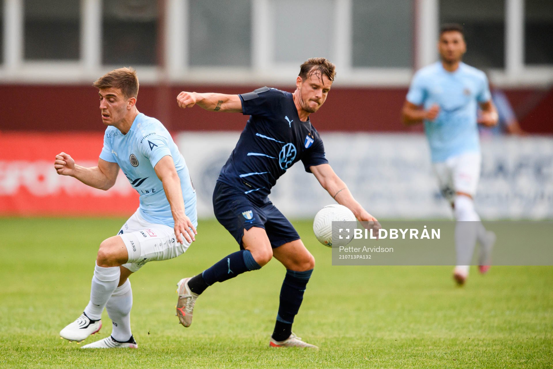 Marko Djurisic of Riga and Eric Larsson of Malmö FF
